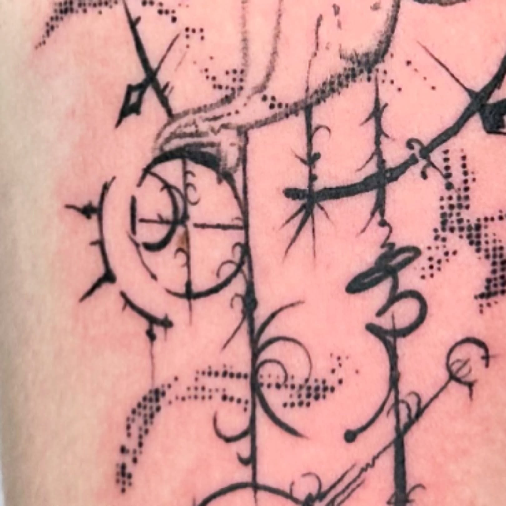 Abstract design dotwork tattoo on the forearm by reid - tattoo artist