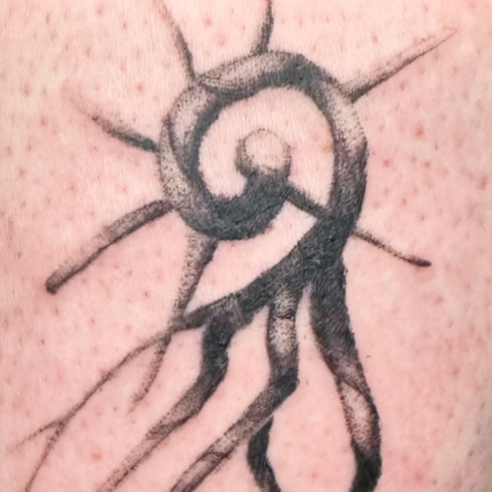 Sunburst dotwork tattoo on the forearm by reid - tattoo artist