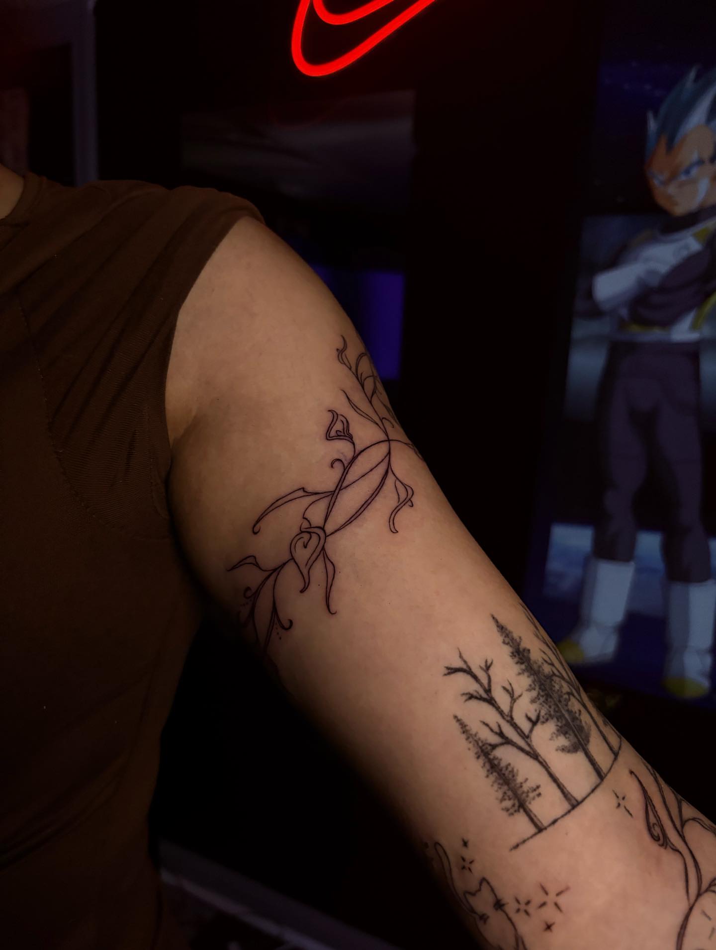 Trees and branches black and grey tattoo on the forearm by Nikko