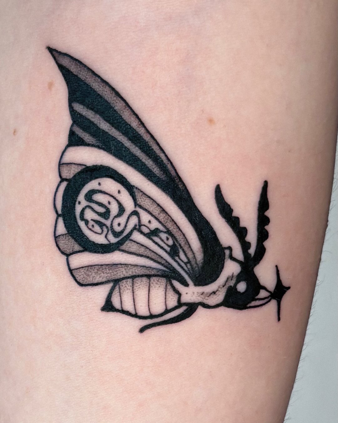 Butterfly black and grey tattoo on the forearm by Kal