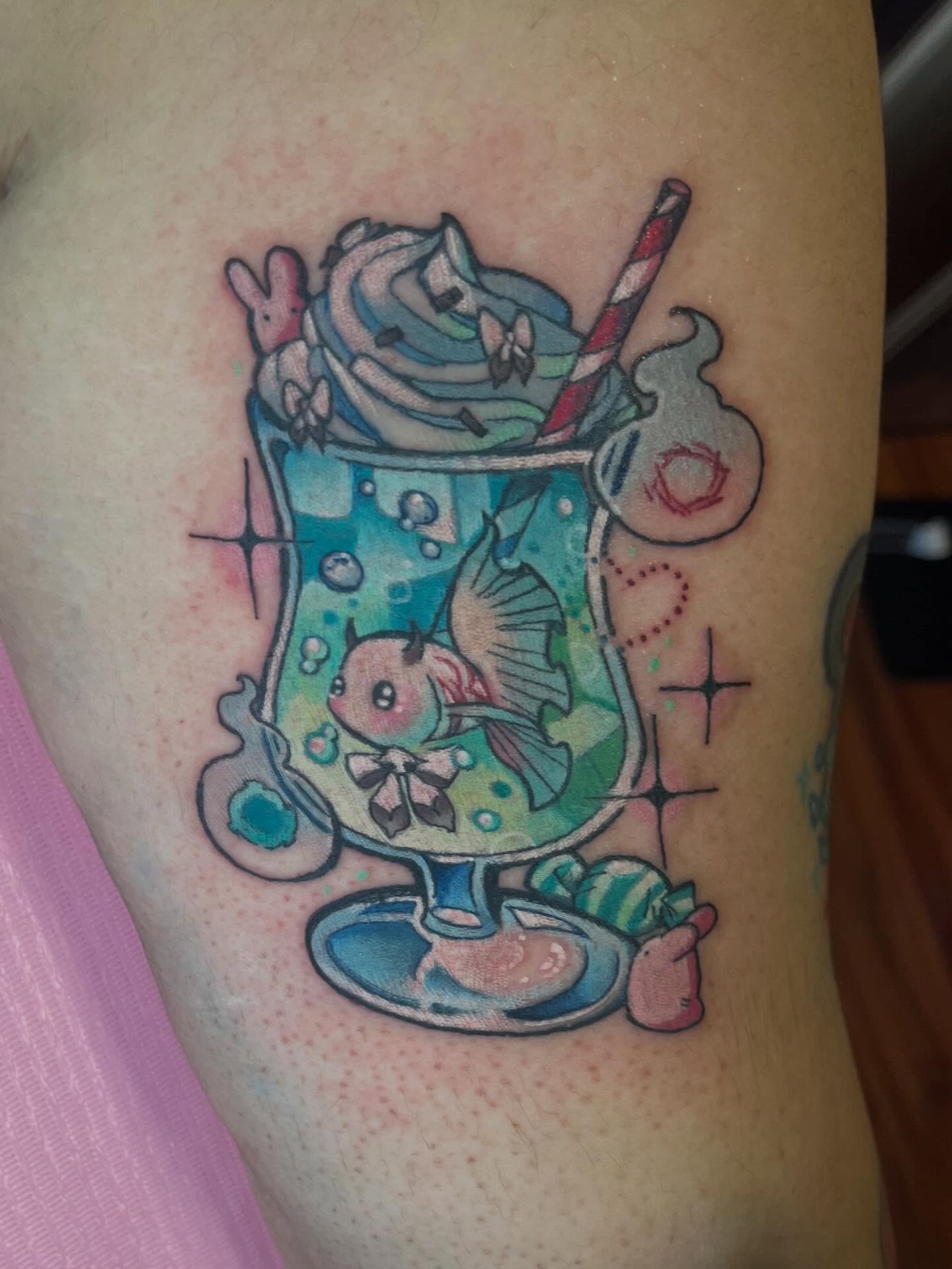 Milkshake with bird new school tattoo on the thigh by Cami Rose