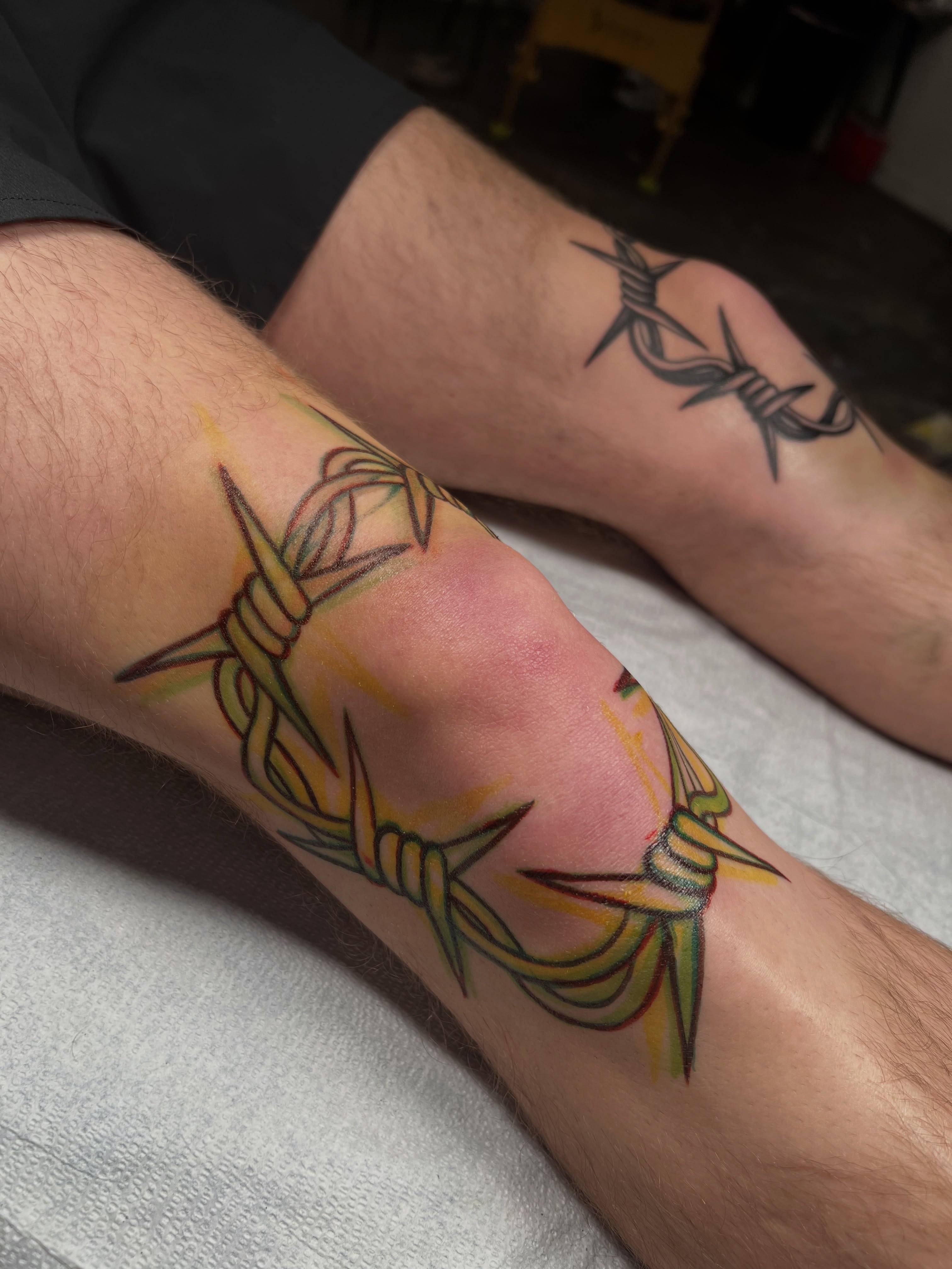 Barbed wire American traditional tattoo on the forearm by Cassidy Maples