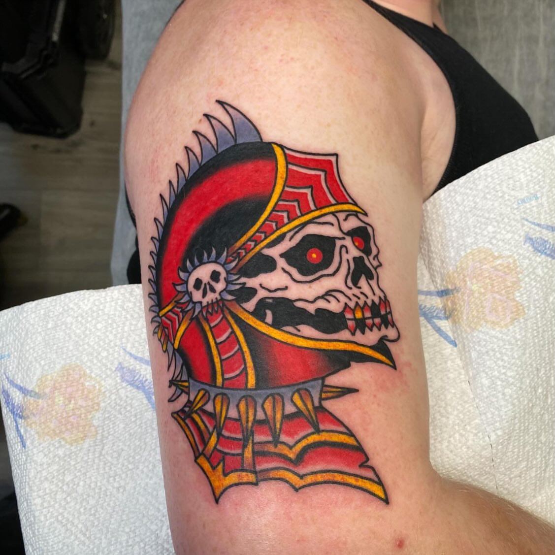 Skull warrior helmet American traditional tattoo on the forearm by Nosferatu
