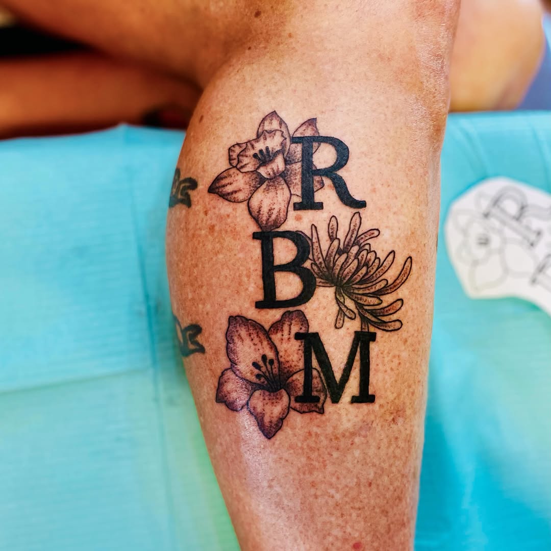 Tattoo by @tommyoconnell_tattoo โ lettering_script, black_and_grey