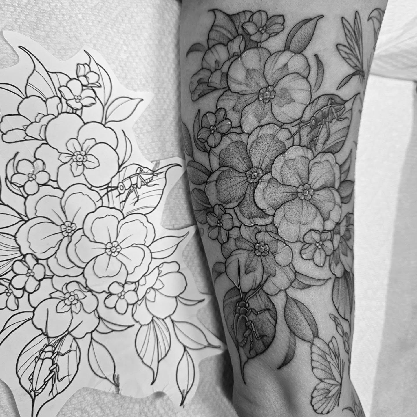 Floral bouquet realism tattoo on the forearm by Dani Bond