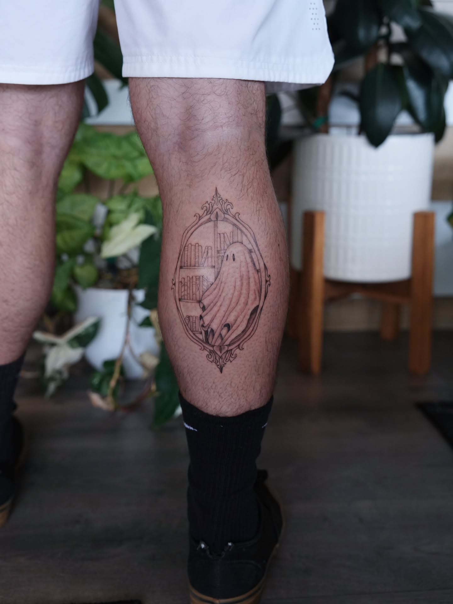 Ghost in mirror black and grey tattoo on the calf by Alex ▪︎ Tattoo Apprentice