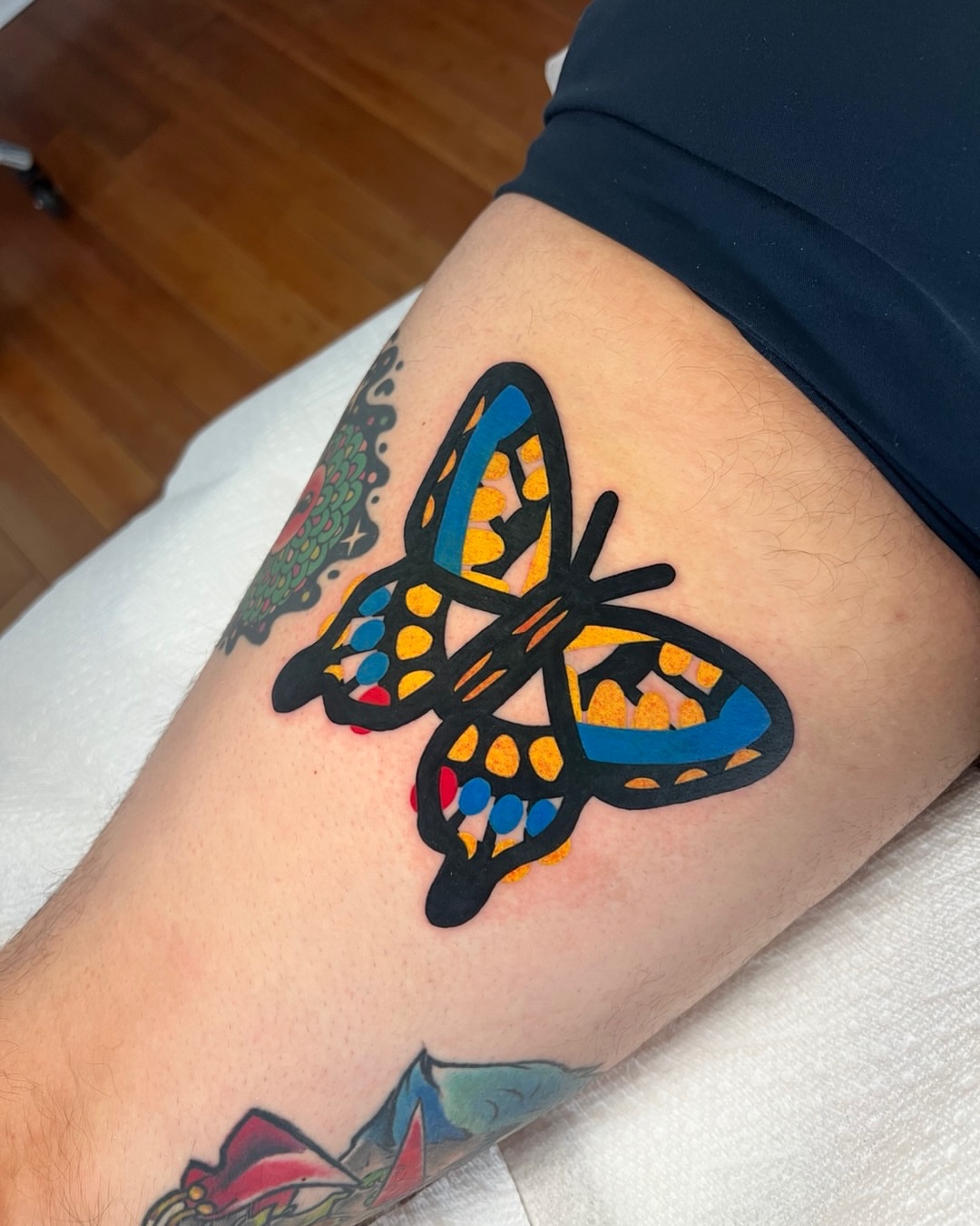 Butterfly dotwork tattoo on the thigh by Tattoo Artist