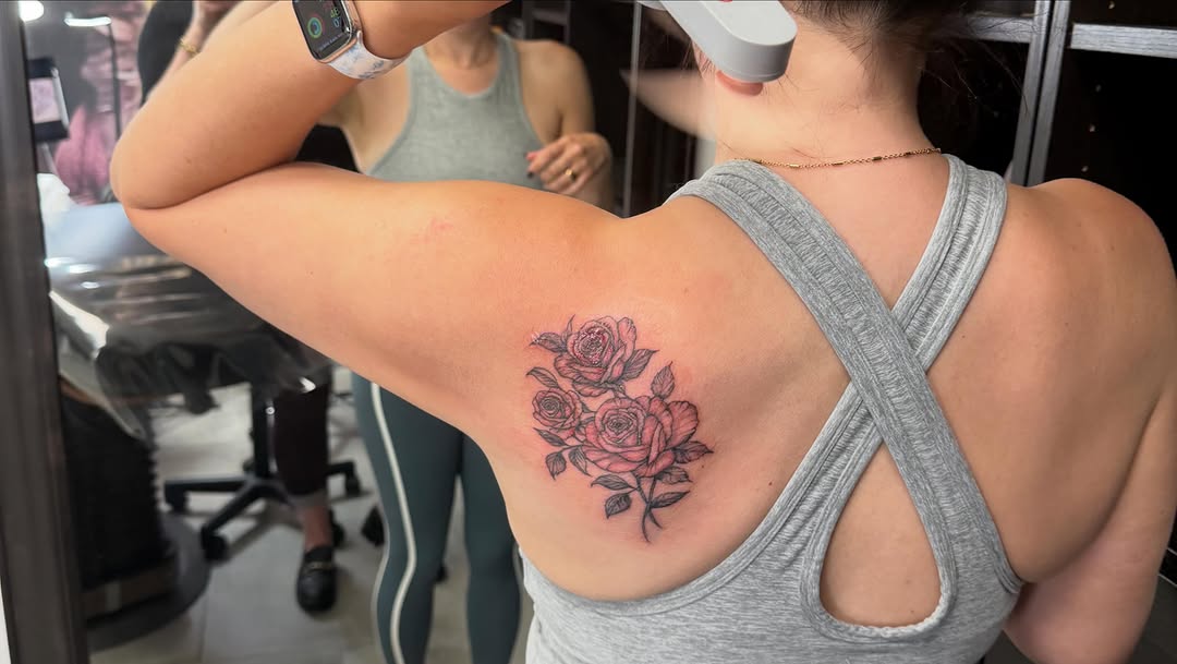 Roses neo-traditional tattoo on the shoulder by Van Cleave Aesthetics, Franklin, Tennessee