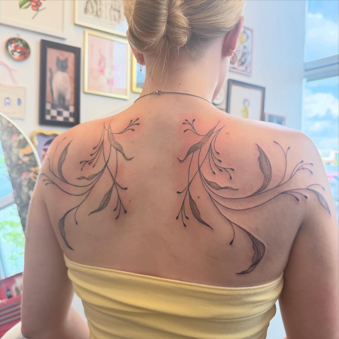 Floral design black and grey tattoo on the back by ✨olivia
