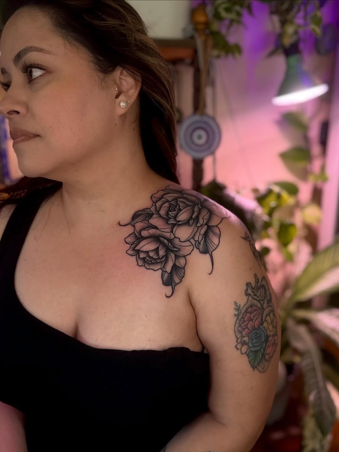 Rose black and grey tattoo on the shoulder by Angie Cotton