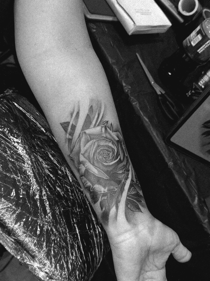 Rose realism tattoo on the forearm by Myles Manuel Lopez, Phoenix, Arizona