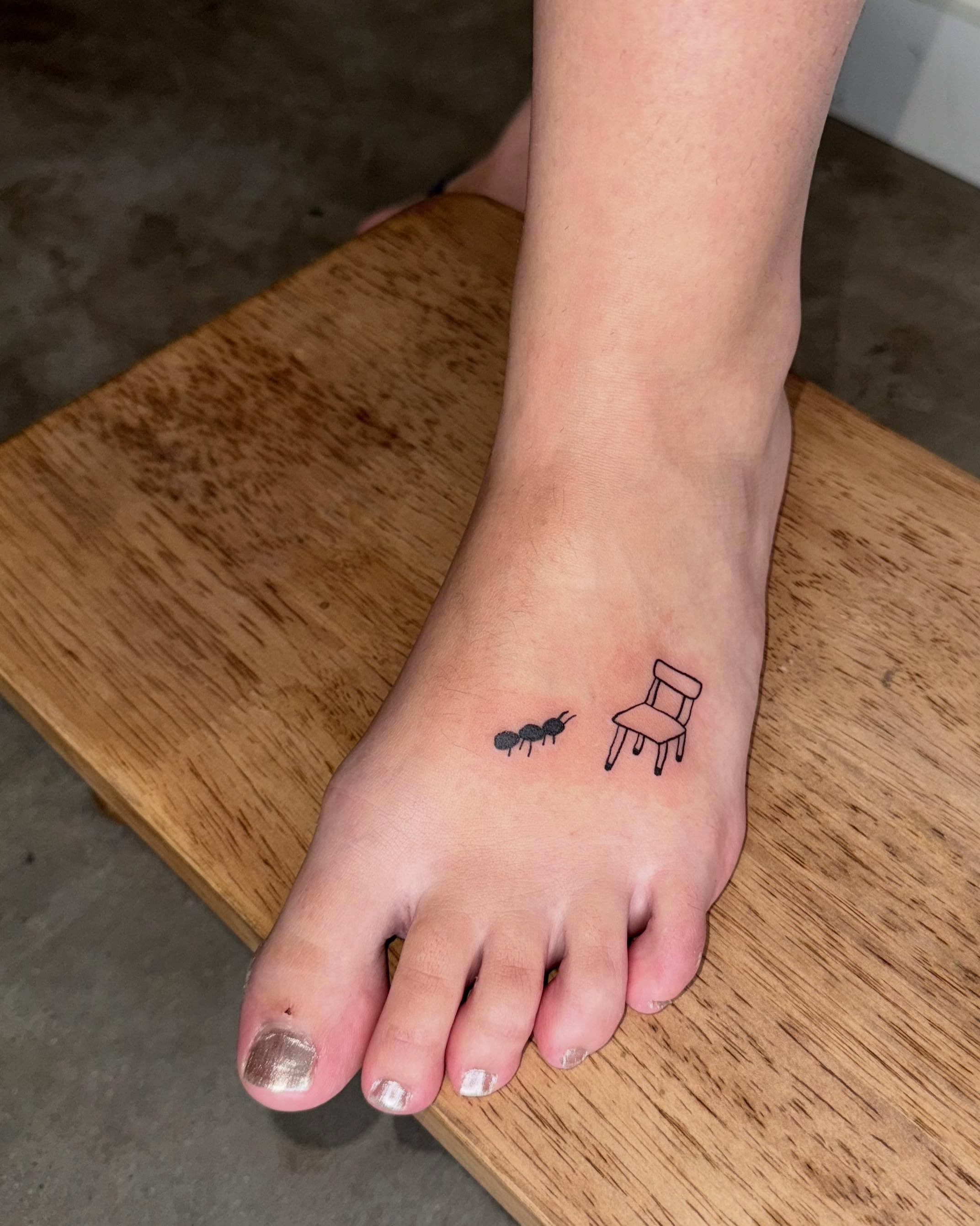 Ant and chair minimalist tattoo on the foot by 림구타투