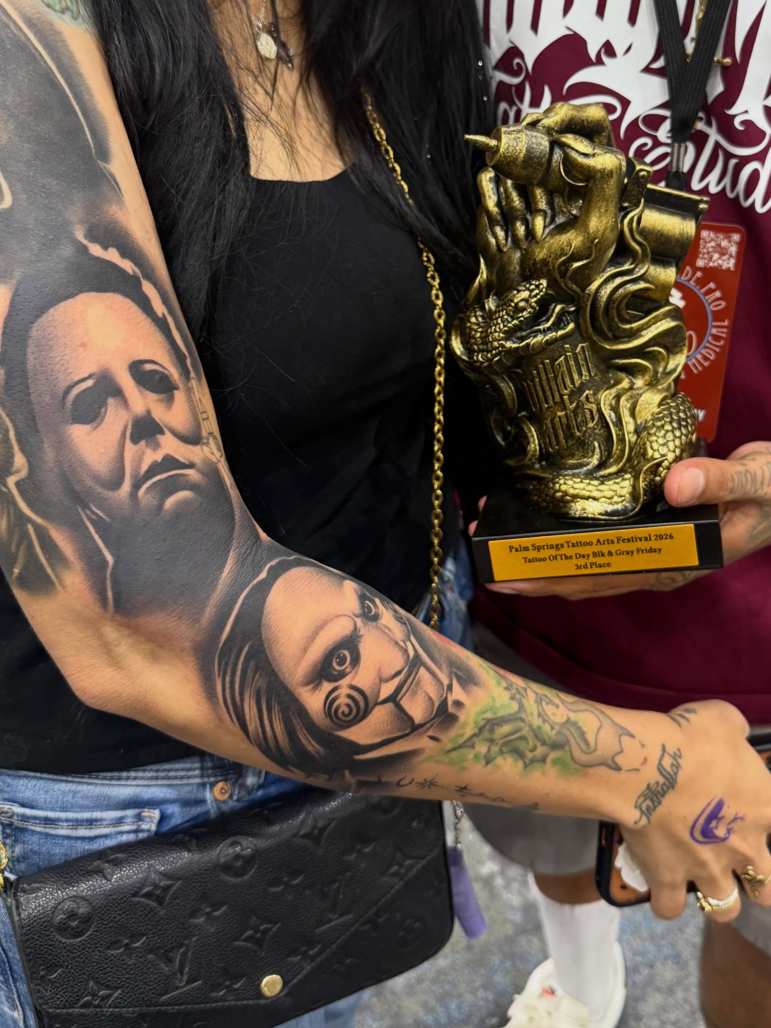 Michael Myers mask realism tattoo on the upper arm by TattooBoyTattoos