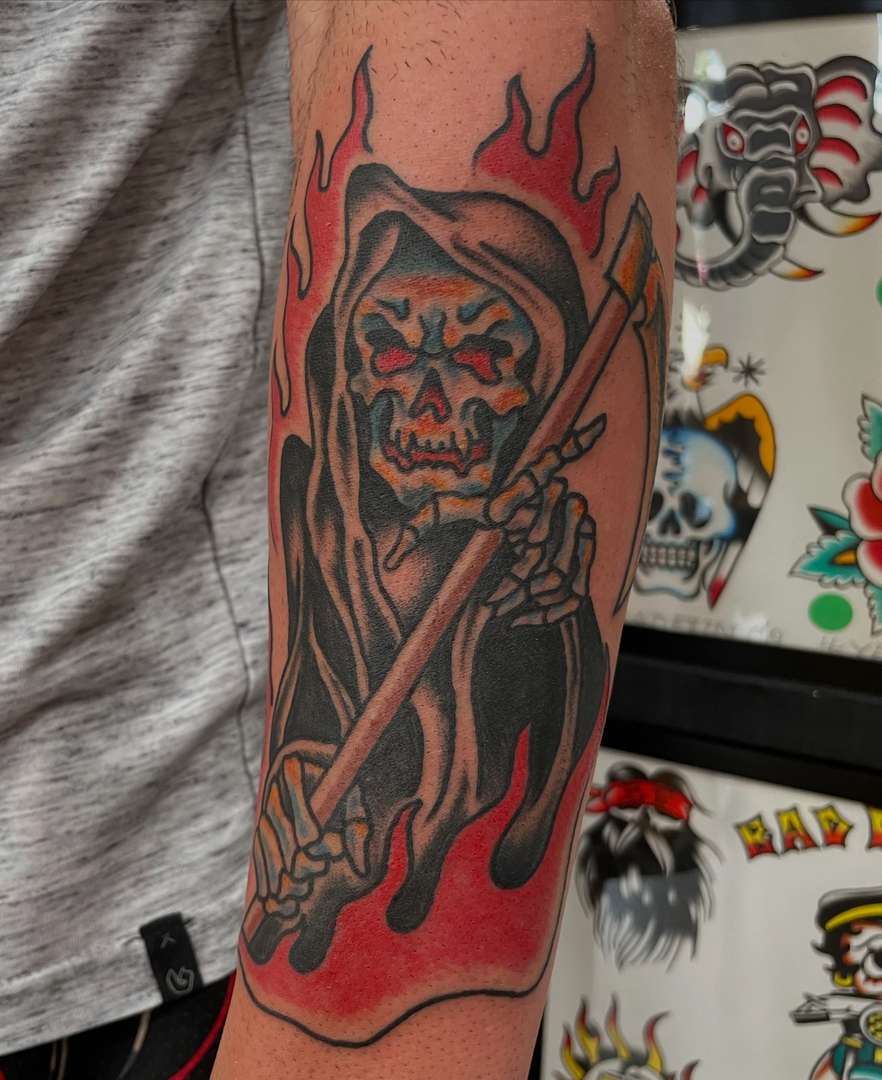 Grim reaper American traditional tattoo on the forearm by Greg De Hoot, Youngsville, North Carolina
