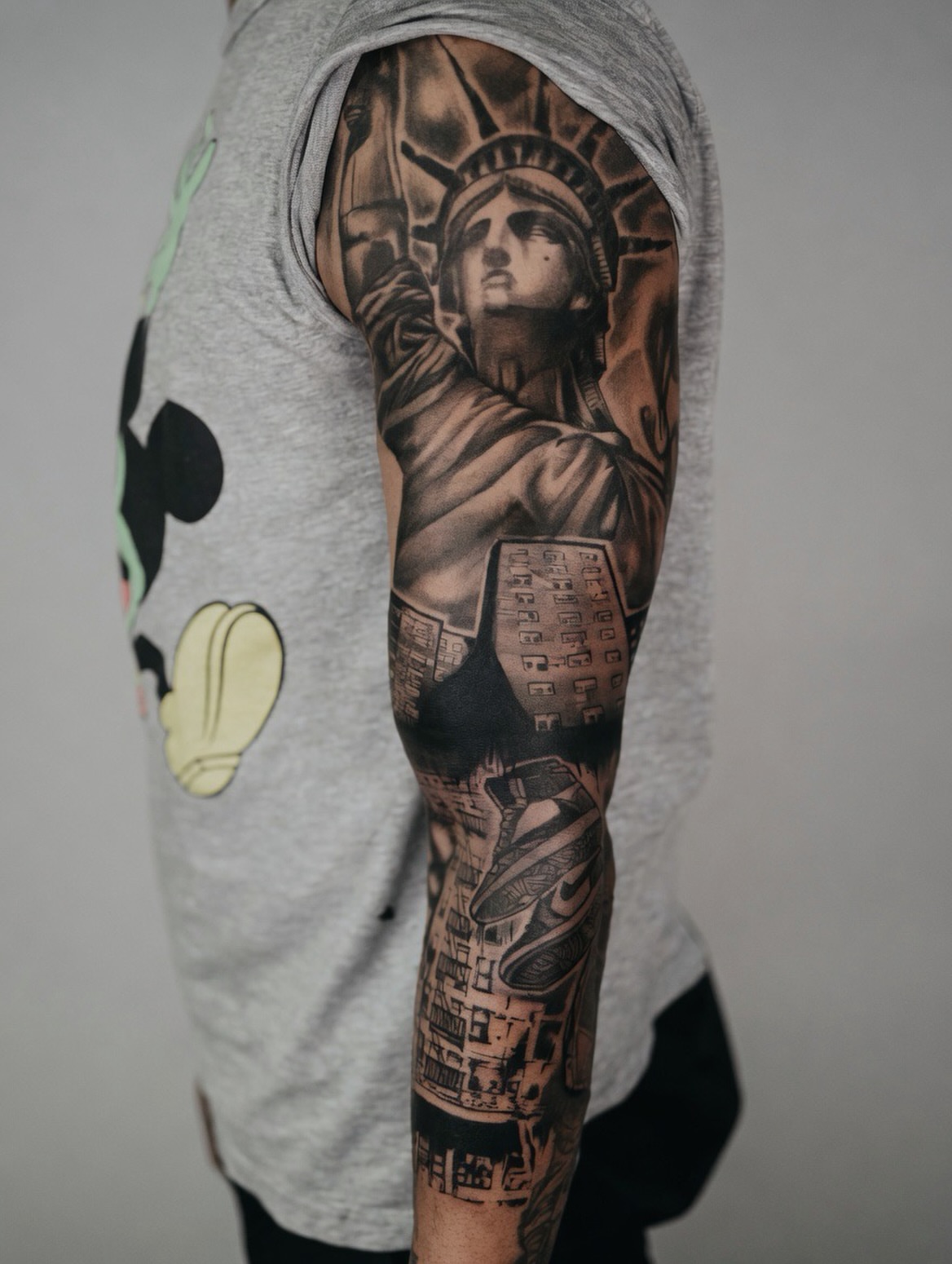 Tattoo by @damoer_tattoo — realism, black_and_grey