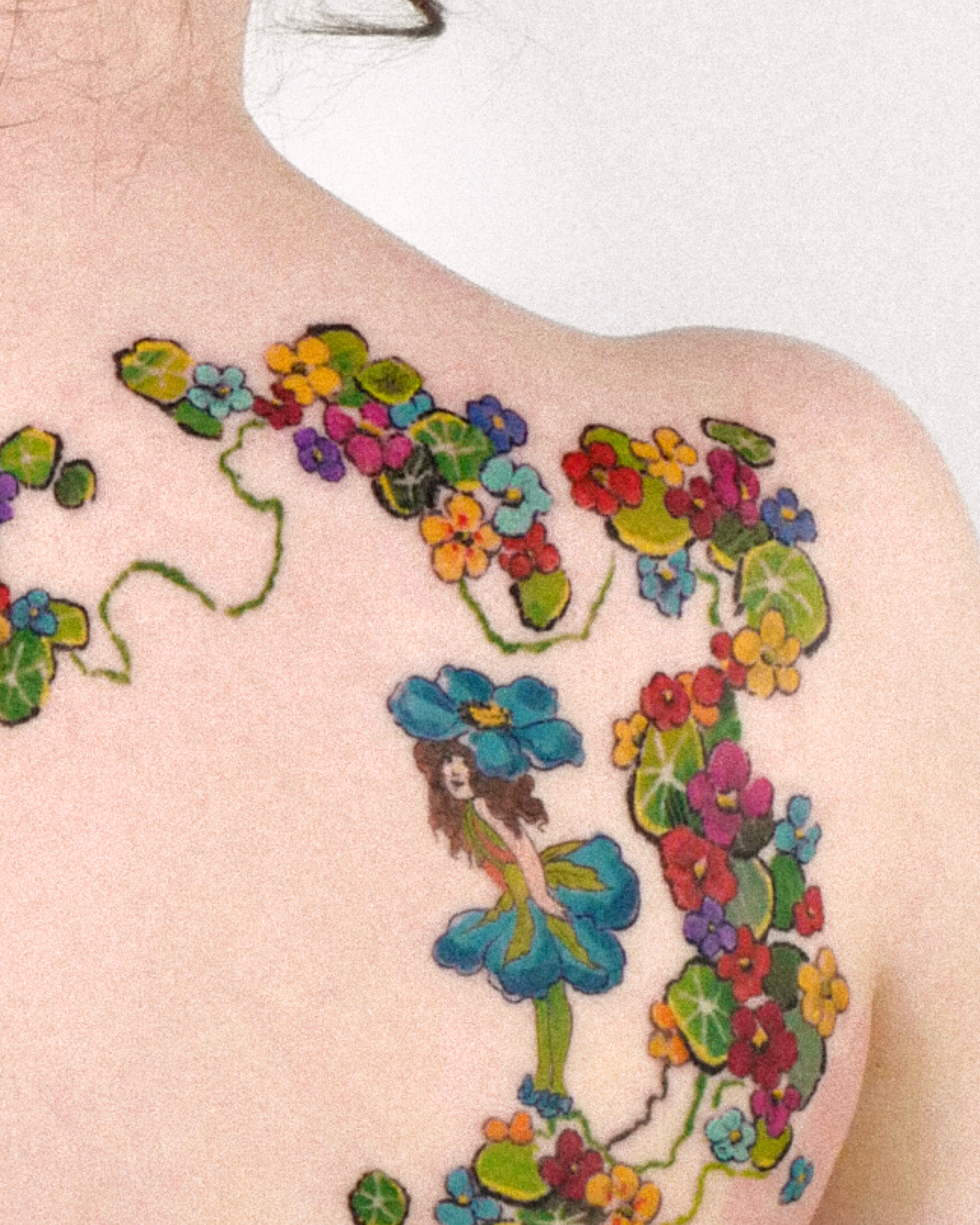 Floral fairy new school tattoo on the shoulder by dahye lee