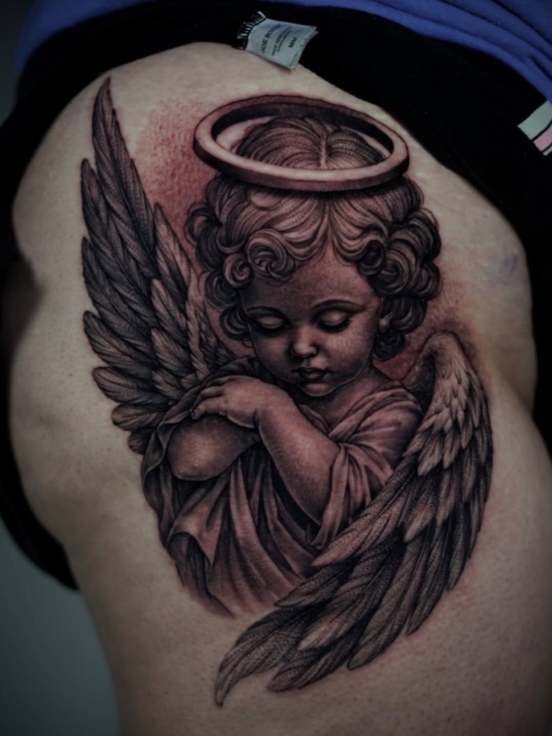 Cherub angel realism tattoo on the shoulder by DREW ROMERO - Colorado Tattoo Artist, Pueblo, Colorado