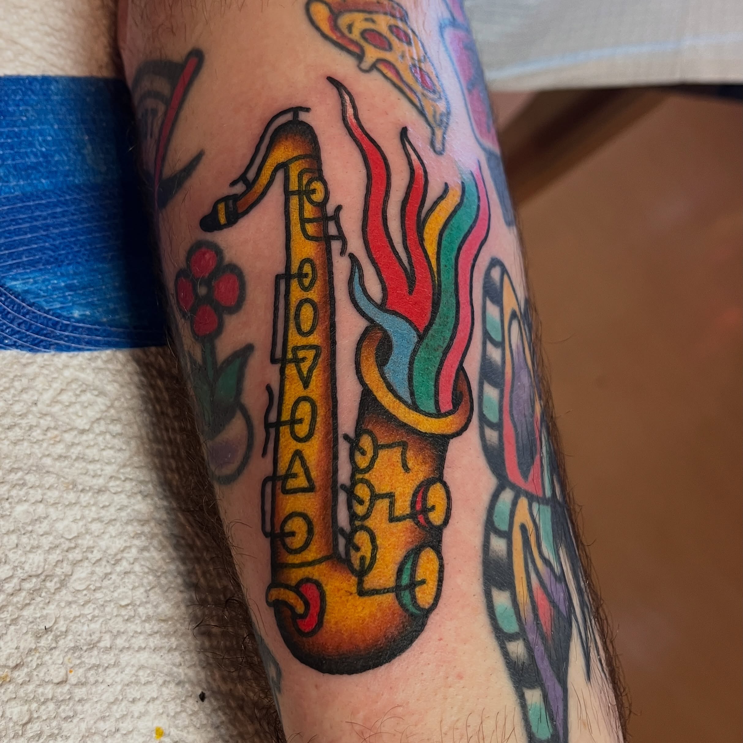 Saxophone American traditional tattoo on the forearm by atomlenhart, Lancaster, Pennsylvania