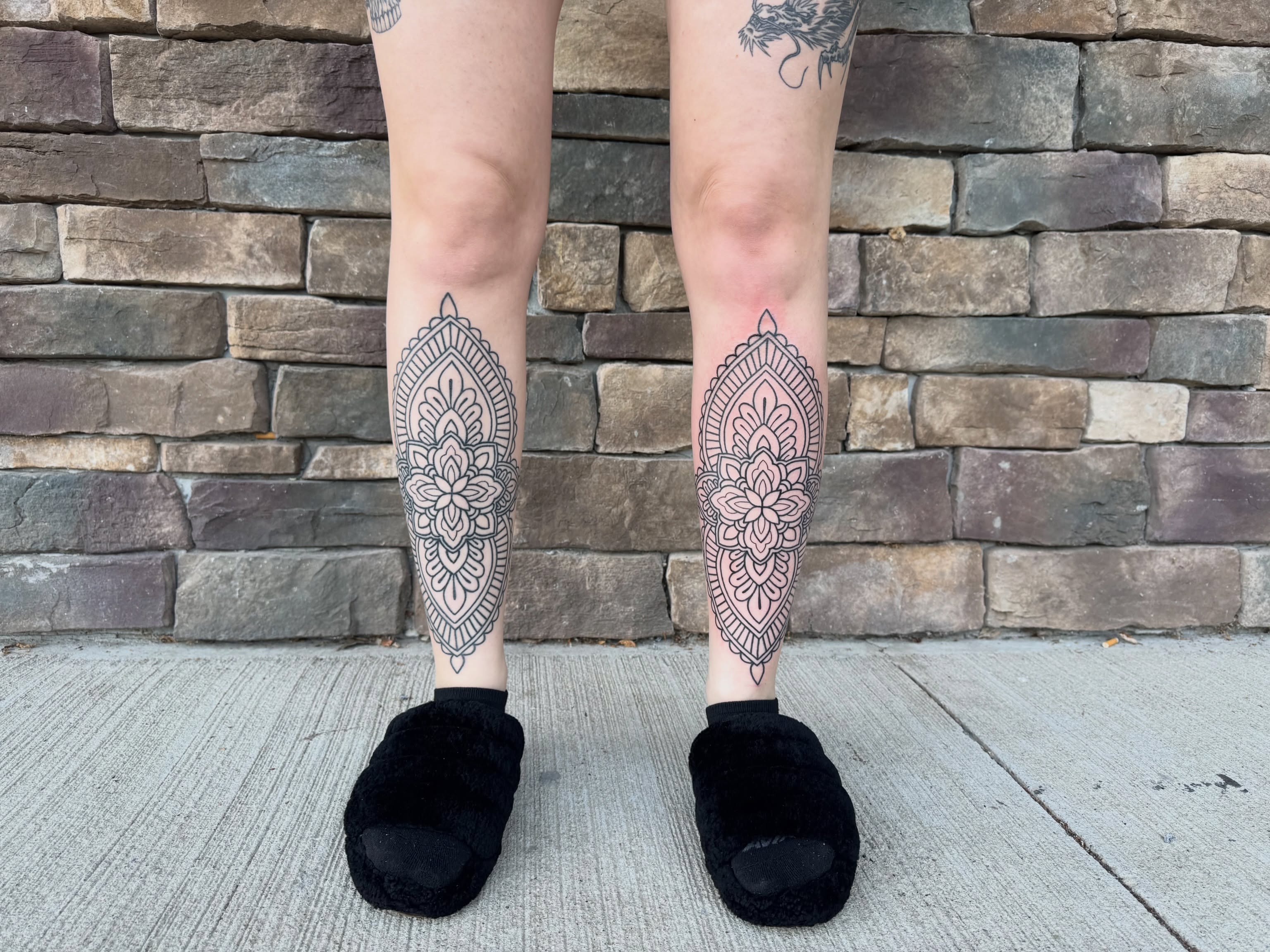 Mandala geometric tattoo on the calf by Cora Phelps
