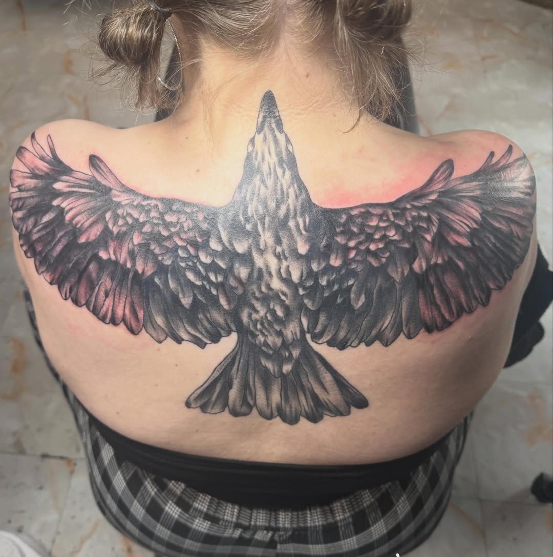 Eagle realism tattoo on the back by Abby