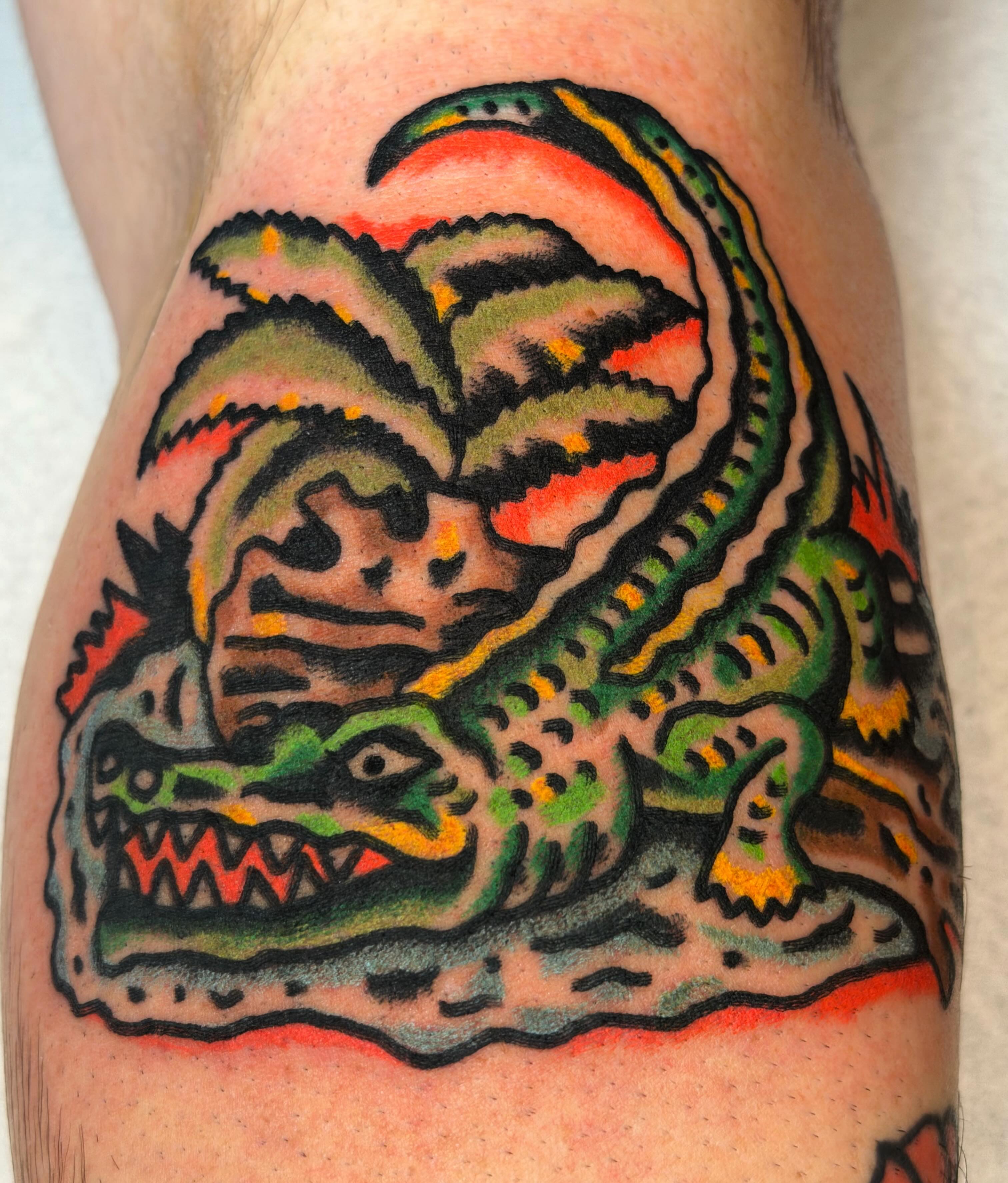 Alligator American traditional tattoo on the forearm by Jake