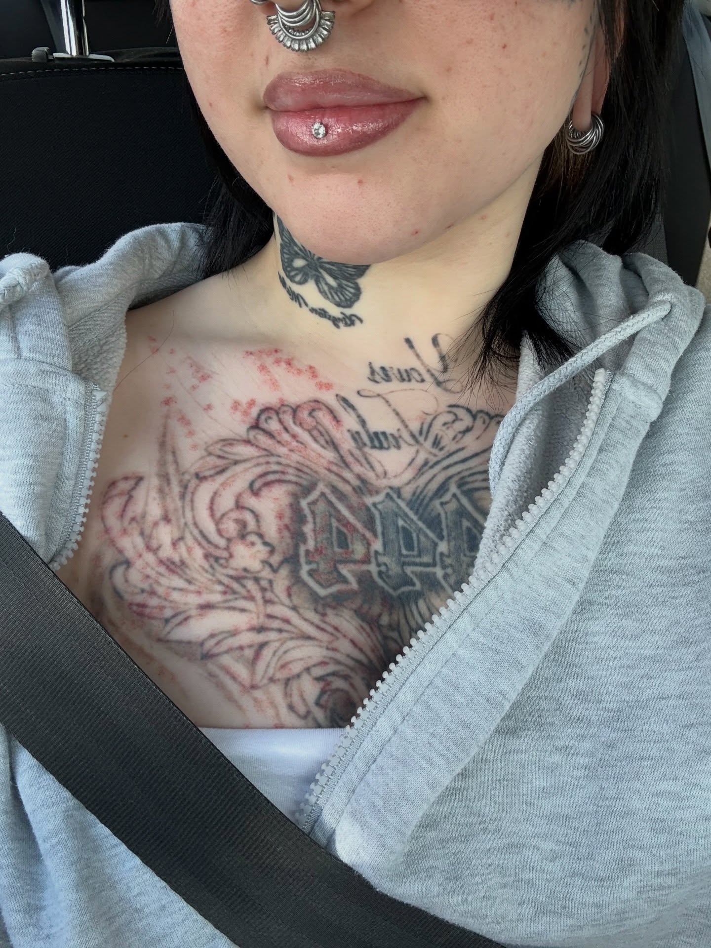 Floral design American traditional tattoo on the chest by Kait