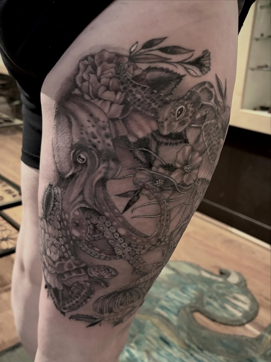 Octopus and sea turtles with flowers Japanese tattoo on the forearm by Ashly Hutchens, Richmond, Virginia