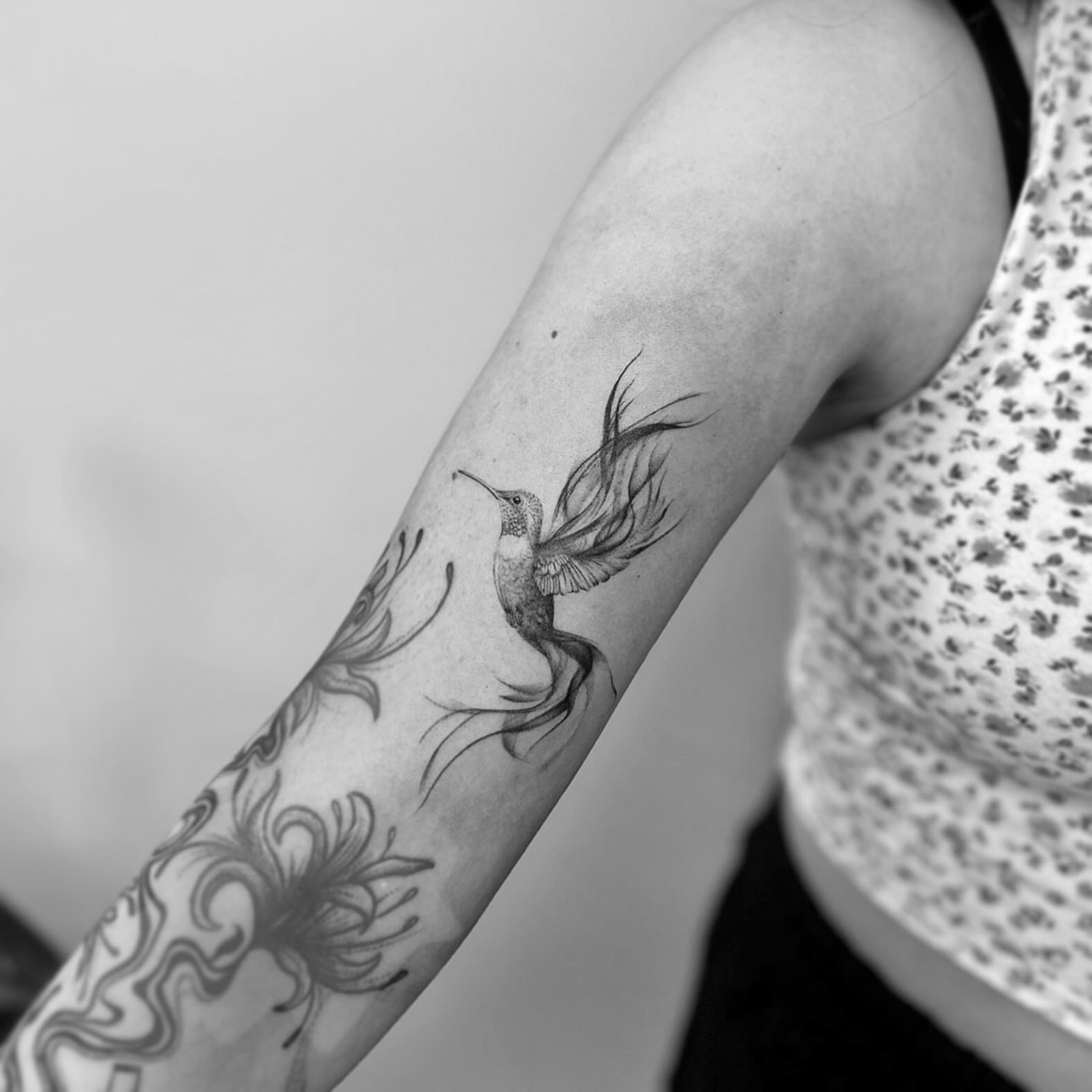 Hummingbird black and grey tattoo on the forearm by L i v π Tattoo Artist. AMITY TATTOO