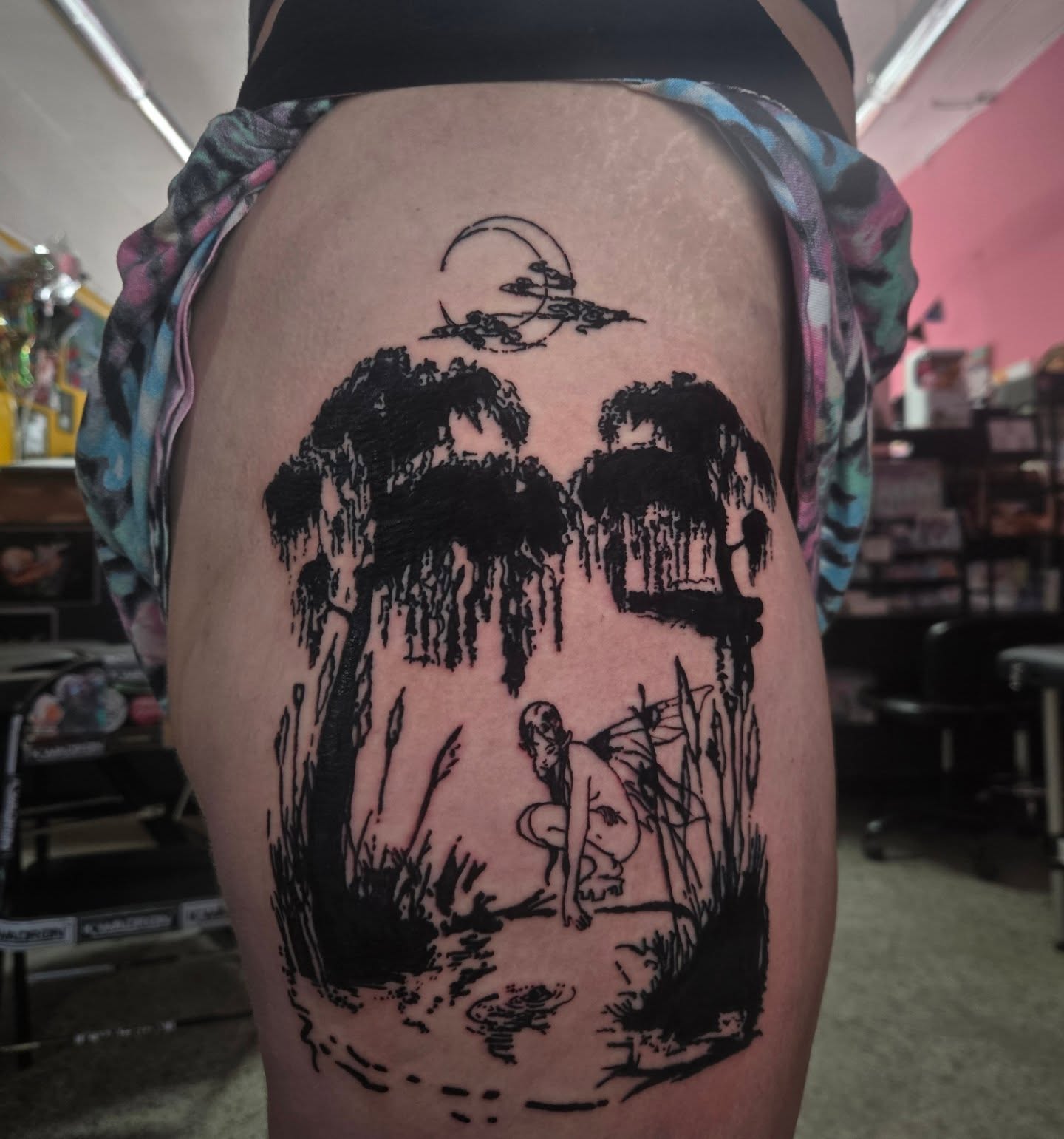 Forest scene black and grey tattoo on the thigh by Lane