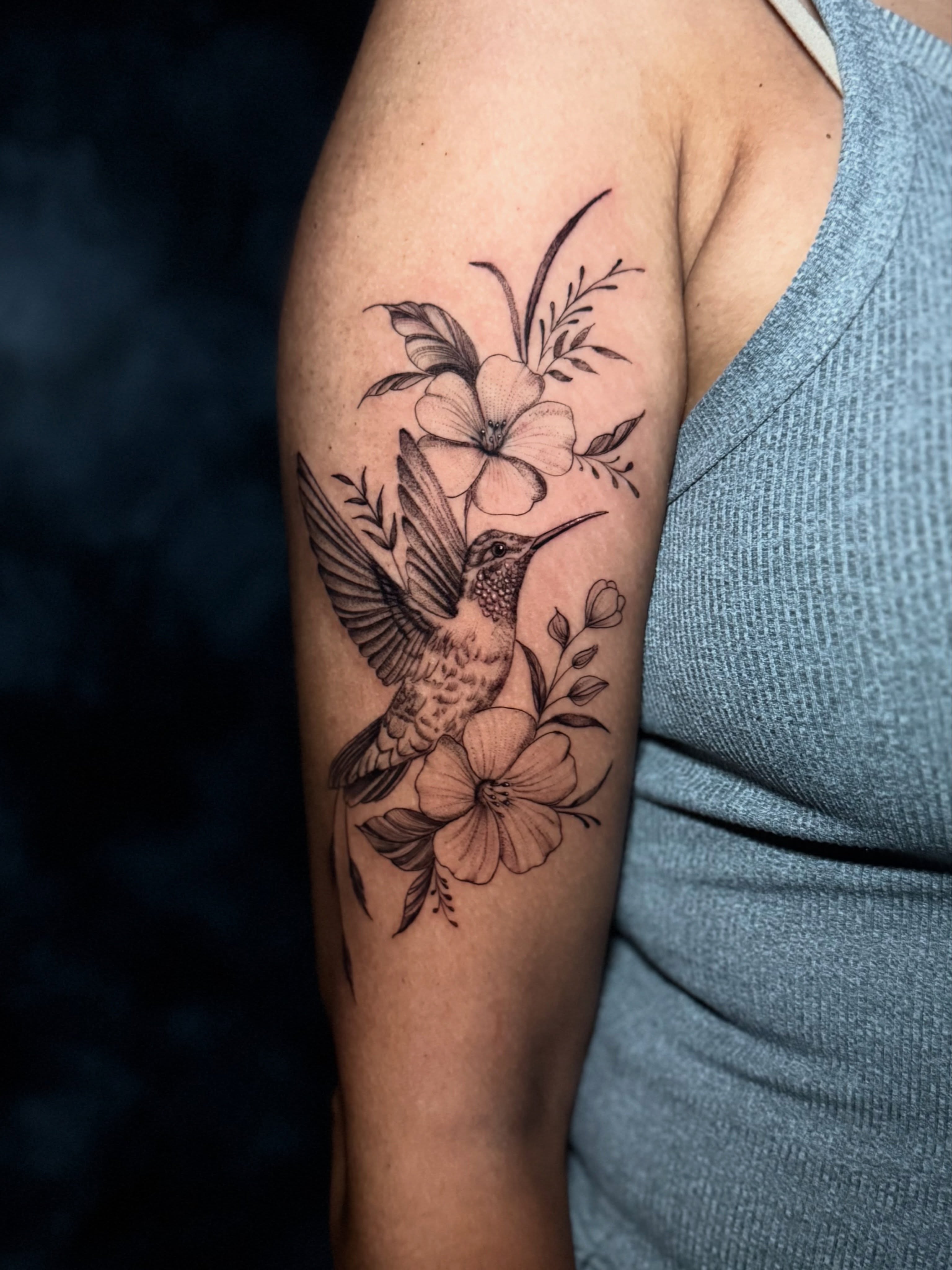Hummingbird and flowers realism tattoo on the forearm by Paola Pineda Tattoo, Knoxville, Tennessee