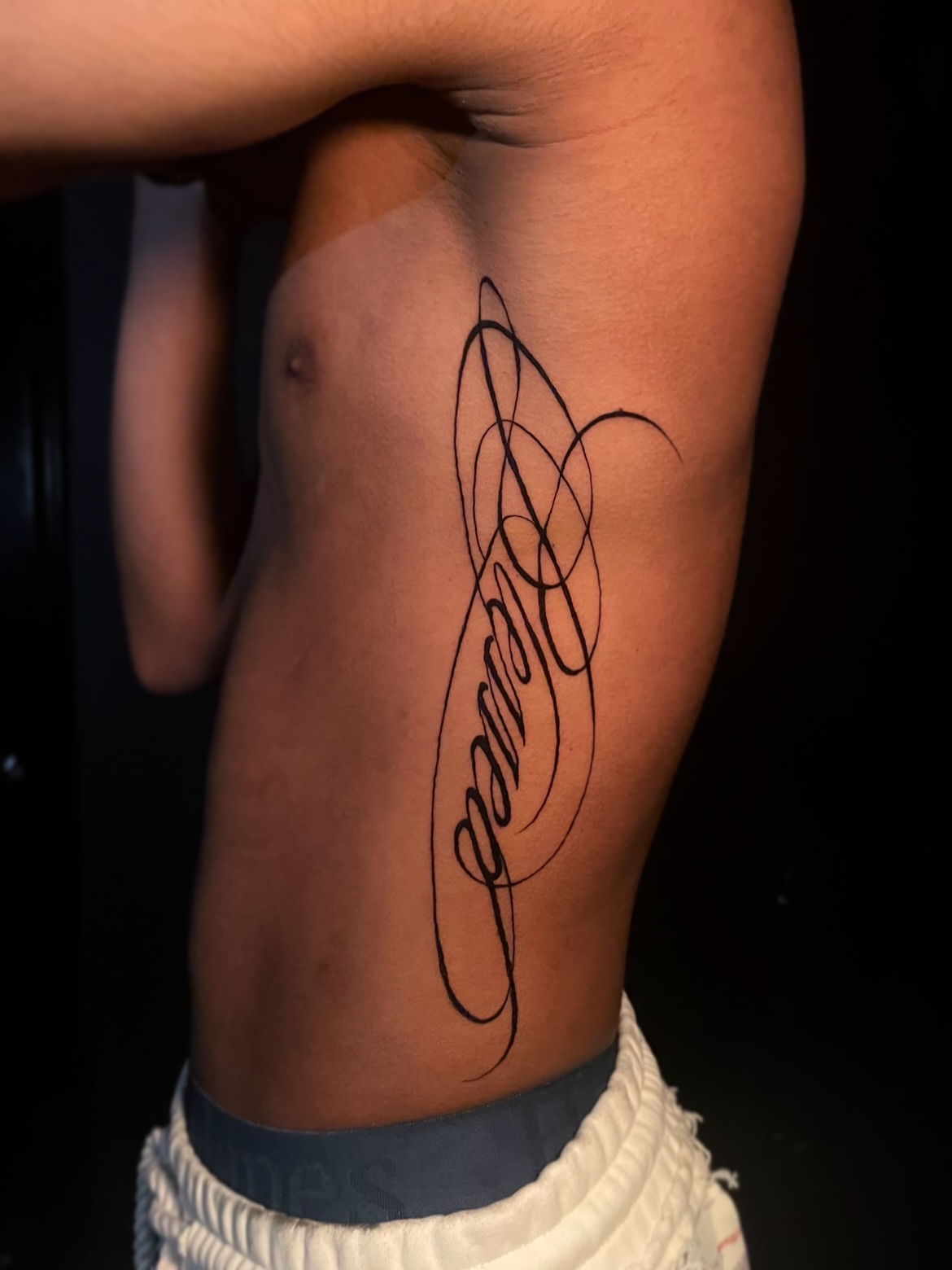 Script lettering lettering script tattoo on the ribs by 𝕲𝖗𝖆𝖈𝖊 🥀 ᴛᴀᴛᴛᴏᴏ