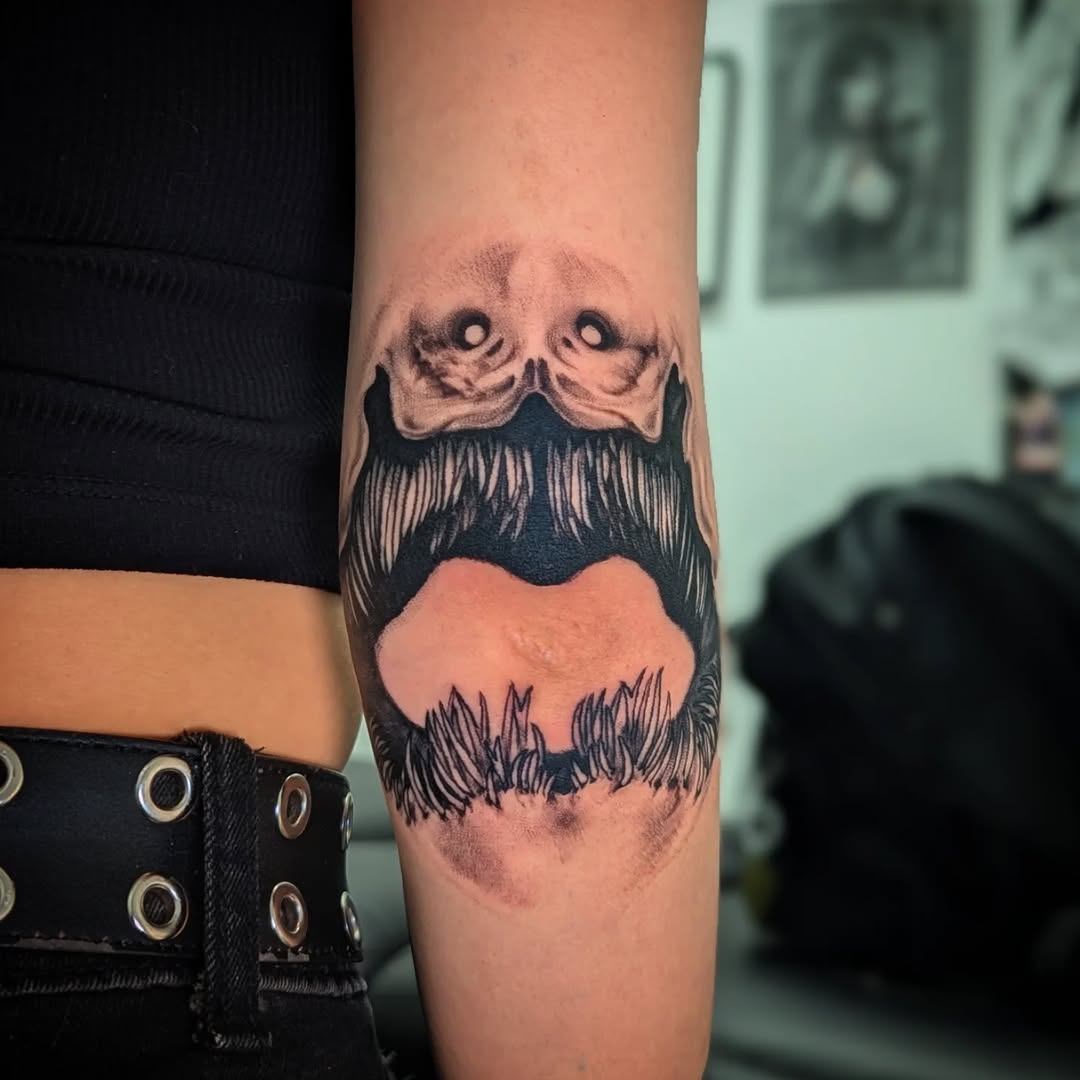 Tattoo by @loreleitattoos — dark_realism, black_and_grey