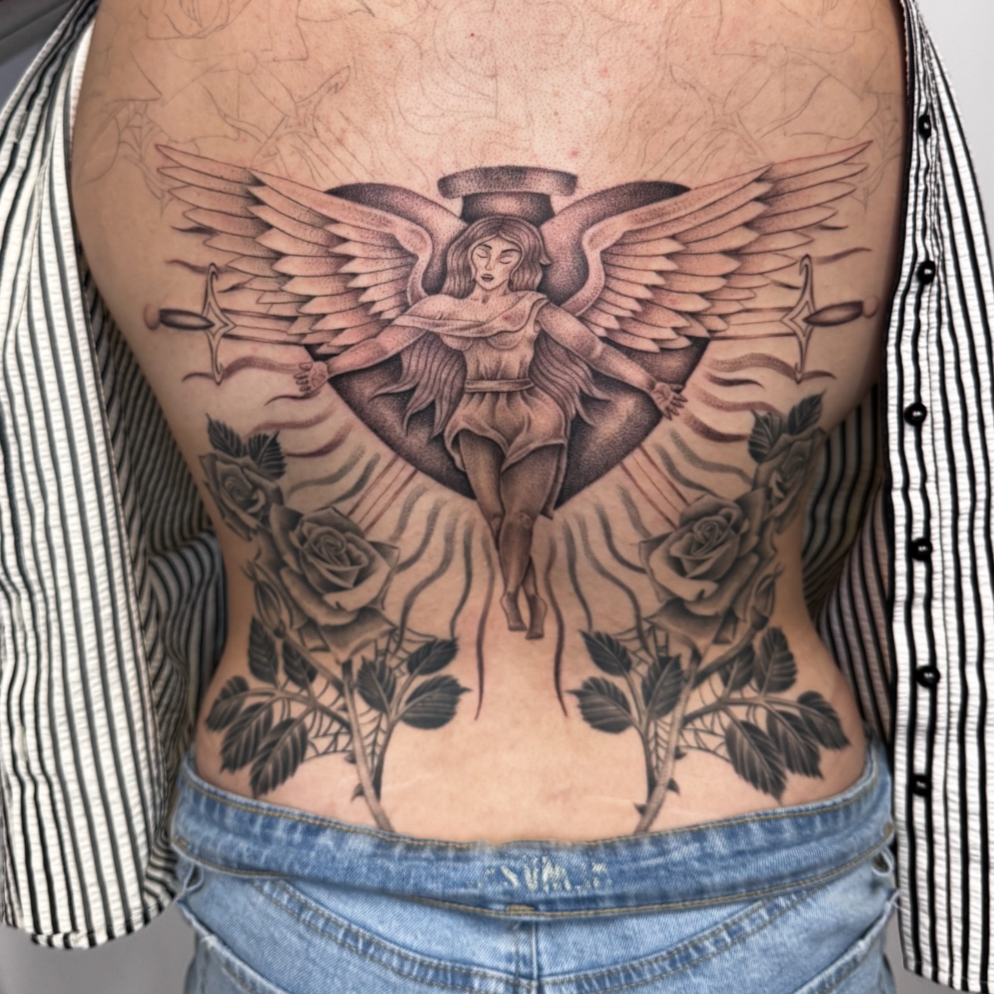 Angel with wings realism tattoo on the ribs by @nudylicioustattoos