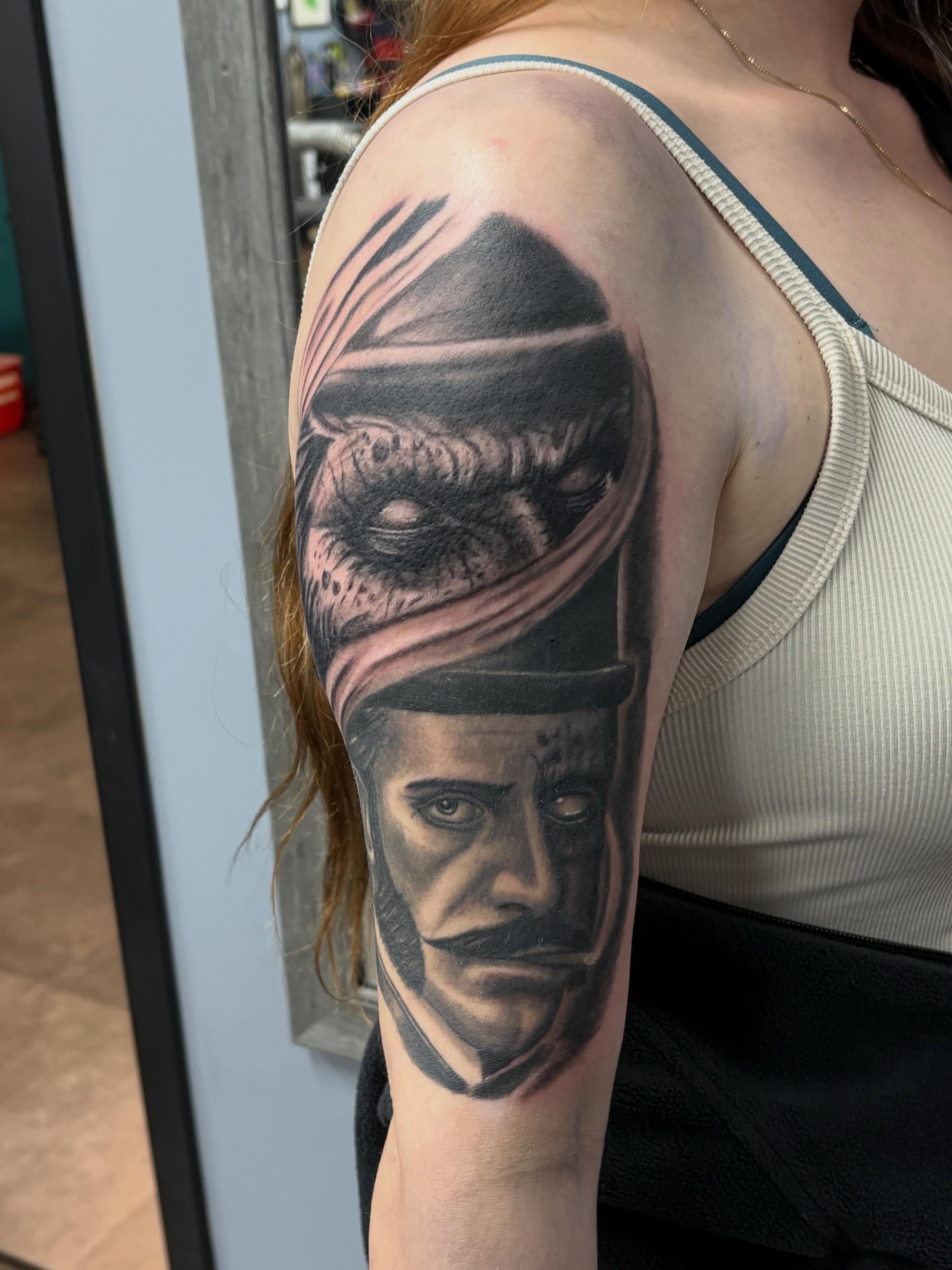 Portrait realism tattoo on the forearm by Jack Ferreri