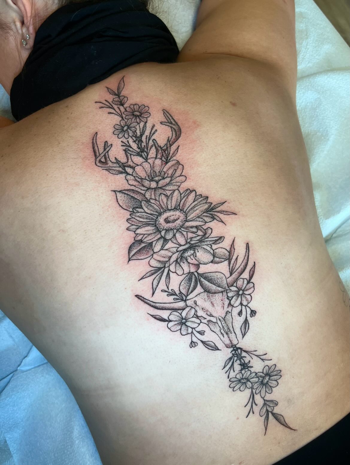 Floral arrangement black and grey tattoo on the ribs by ππππππ ππππππ - ππππ‘ππ₯ ππ¨π₯π’πππ«π’π¨π¬ π΅π