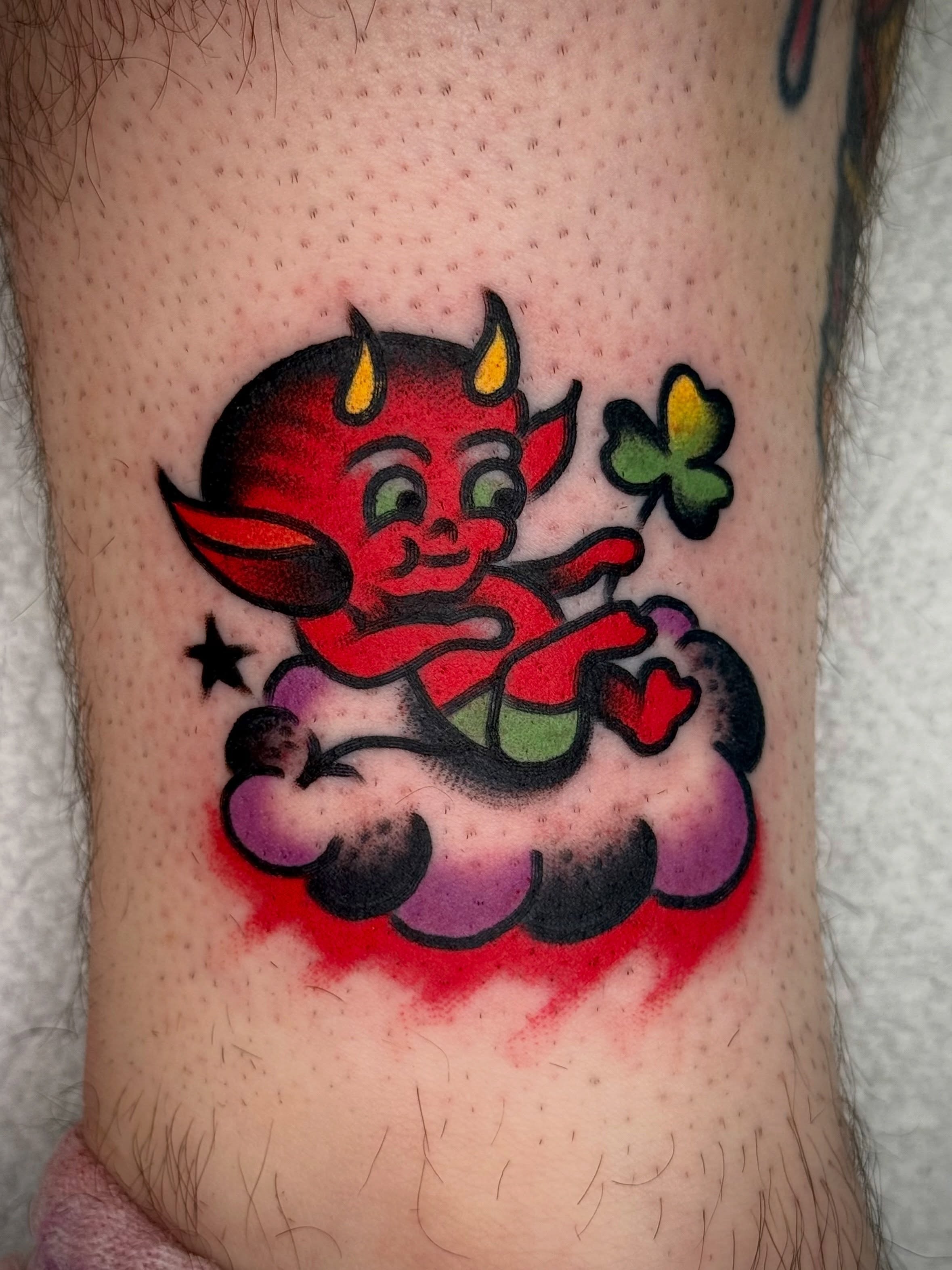 Devil American traditional tattoo on the forearm by Maximilian Harrison