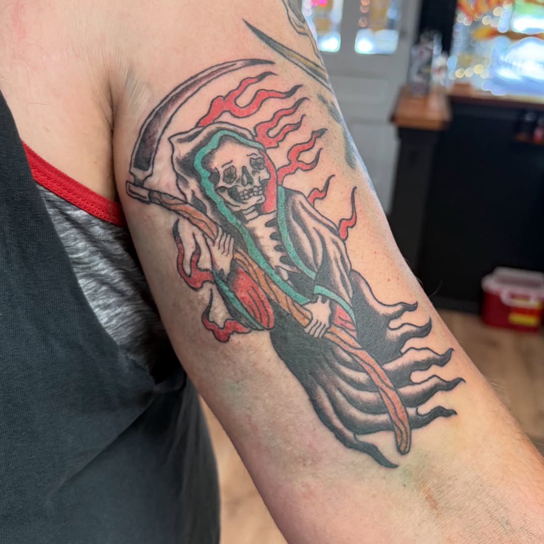 Grim reaper American traditional tattoo on the forearm by Tyler H. Moon