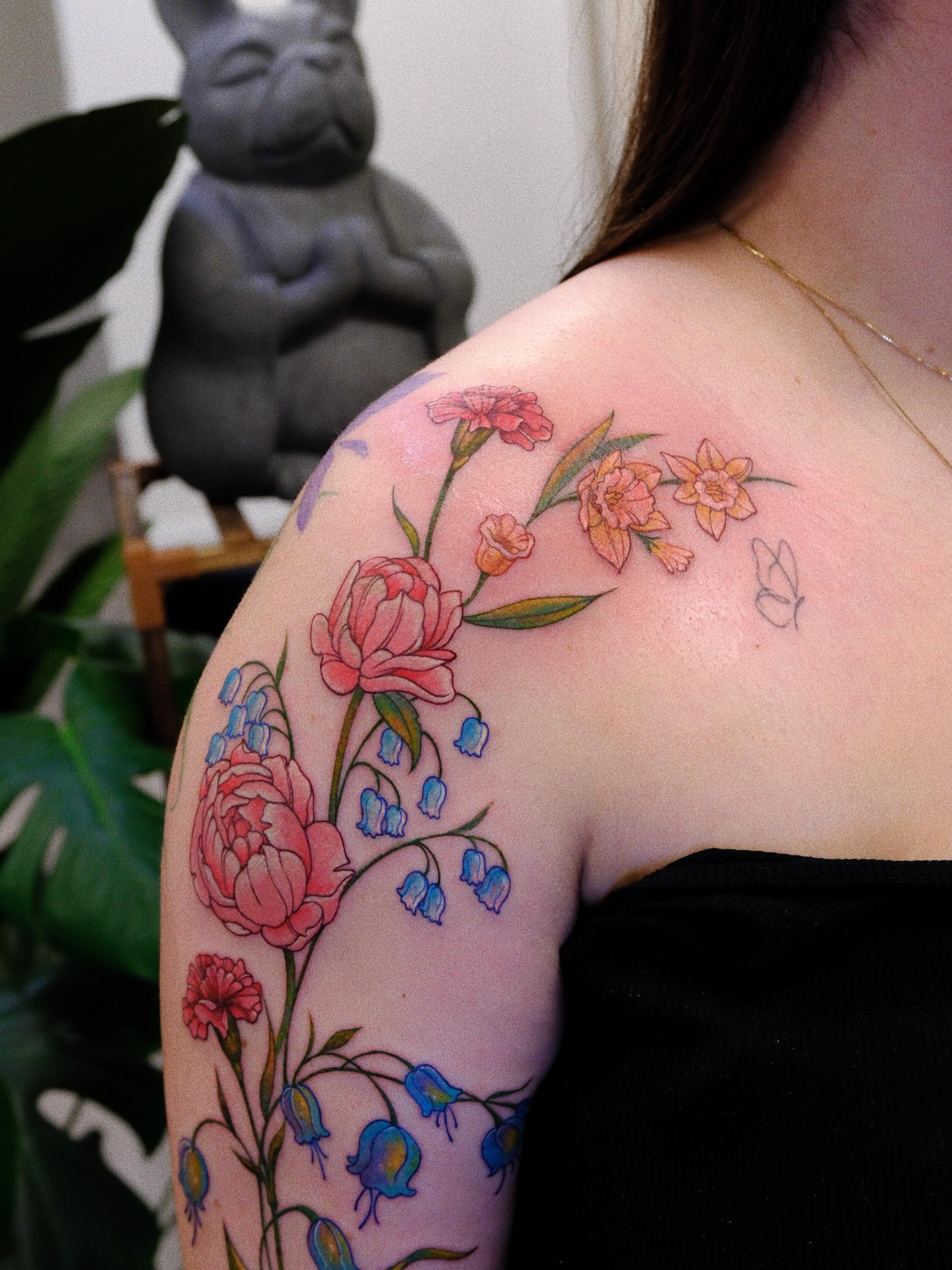 Floral bouquet new school tattoo on the shoulder by rita_tattooist