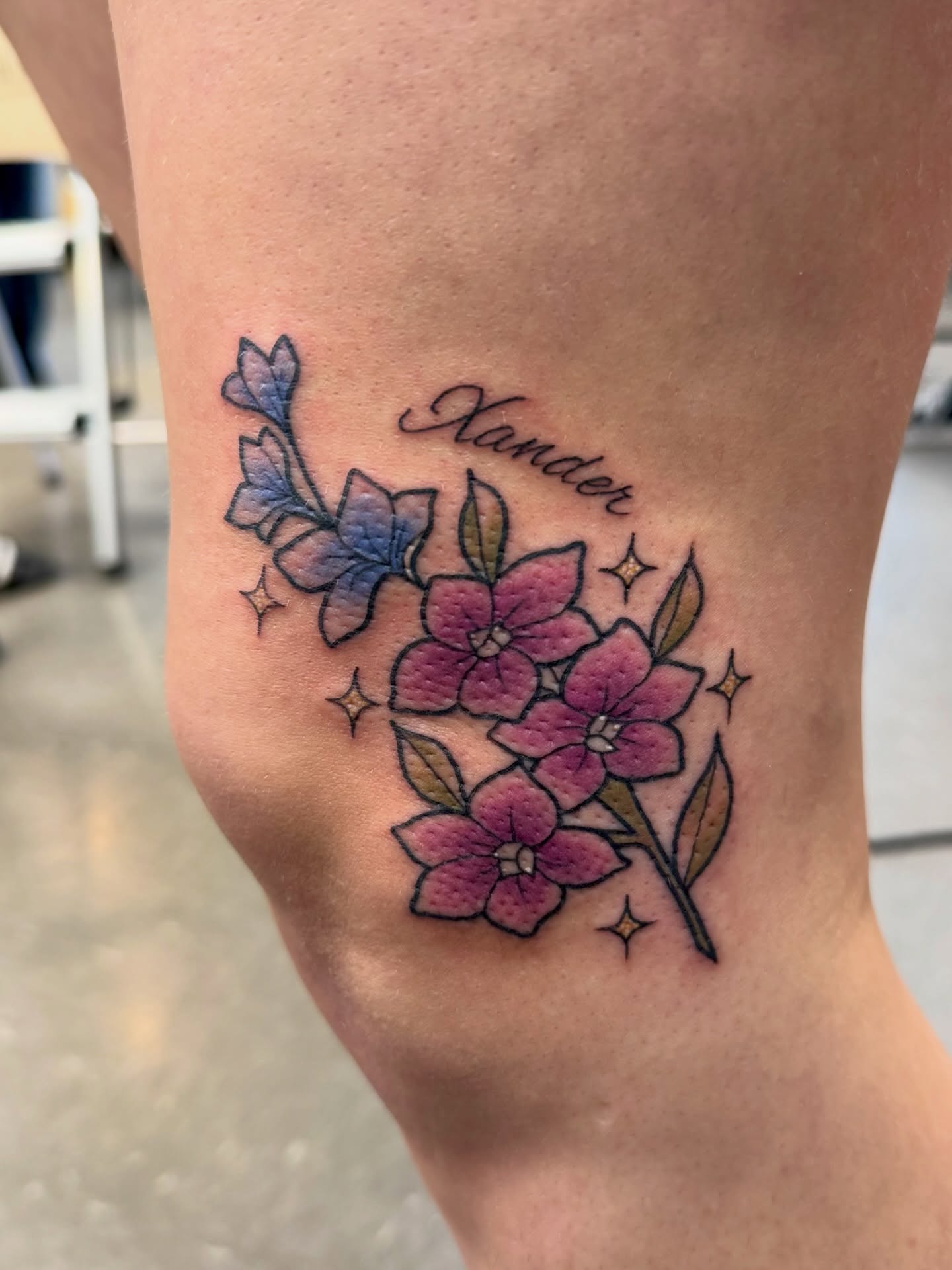 Flowers and butterflies new school tattoo on the thigh by Samantha Jane