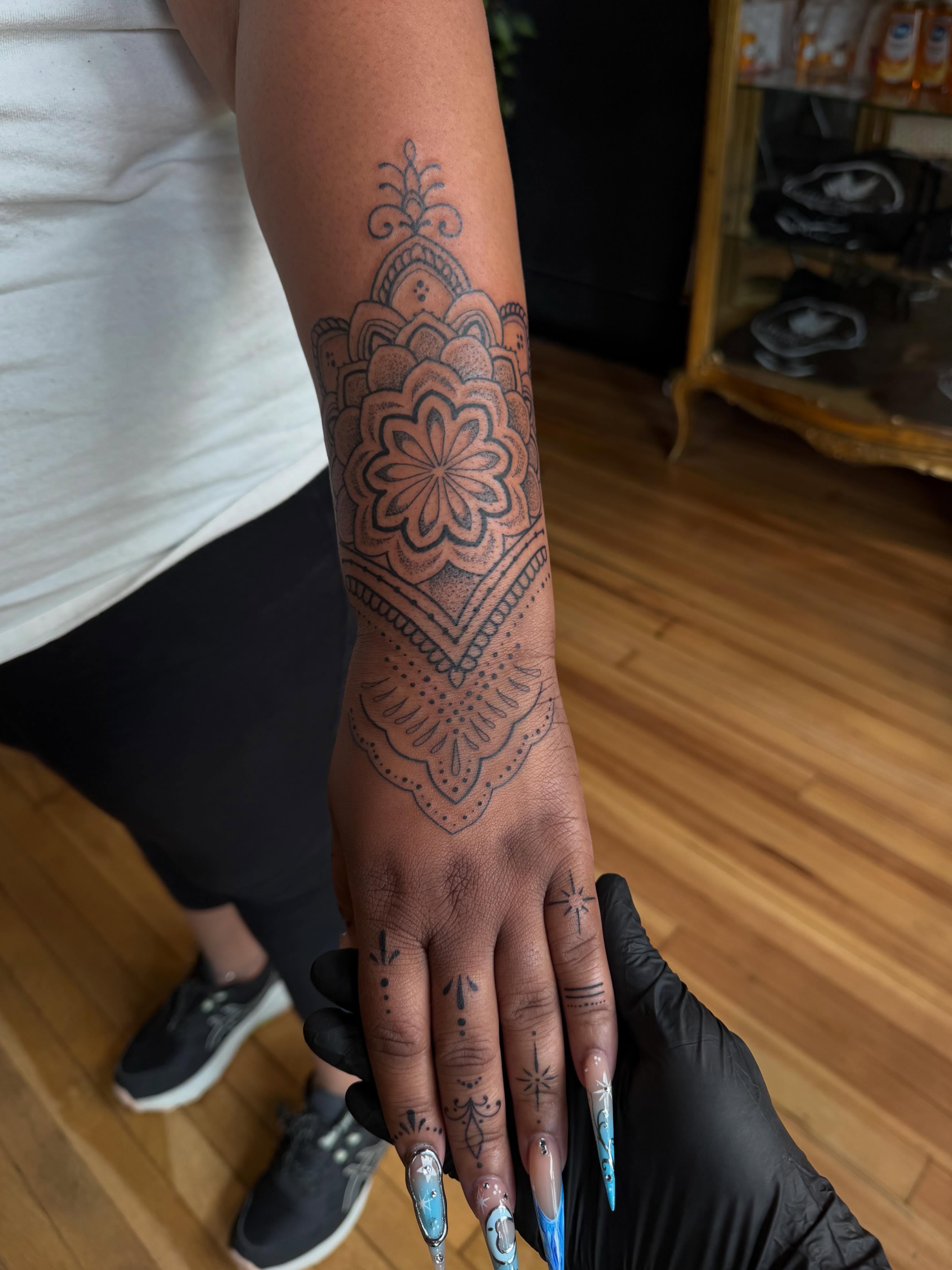Mandala dotwork tattoo on the forearm by Allison