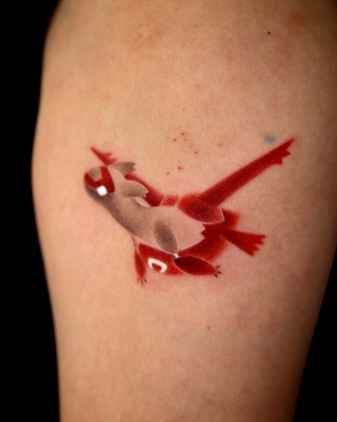 Bird minimalist tattoo on the upper arm by Toki