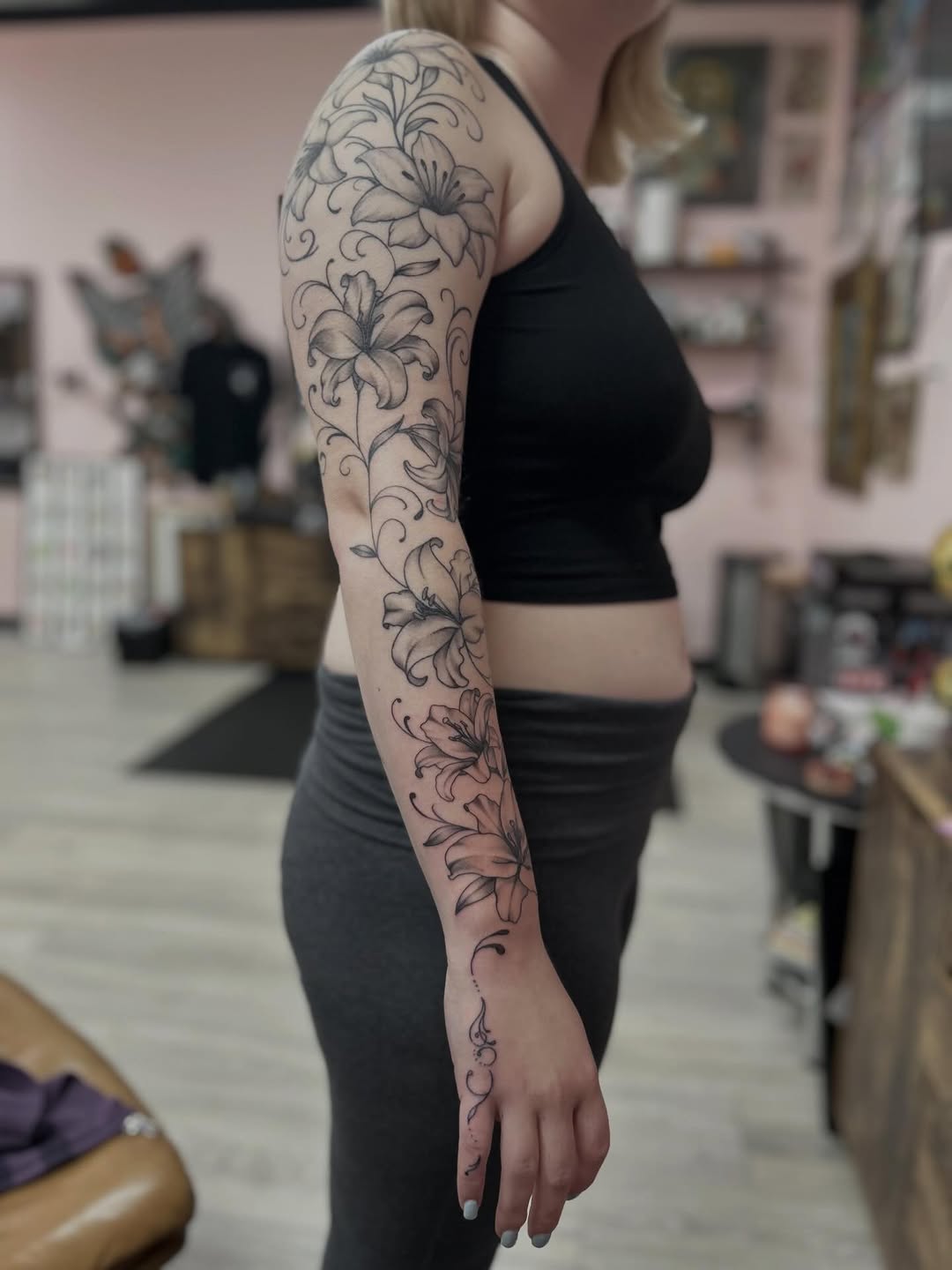 Lily flowers fine line tattoo on the forearm by Red✨, Gansevoort, New York