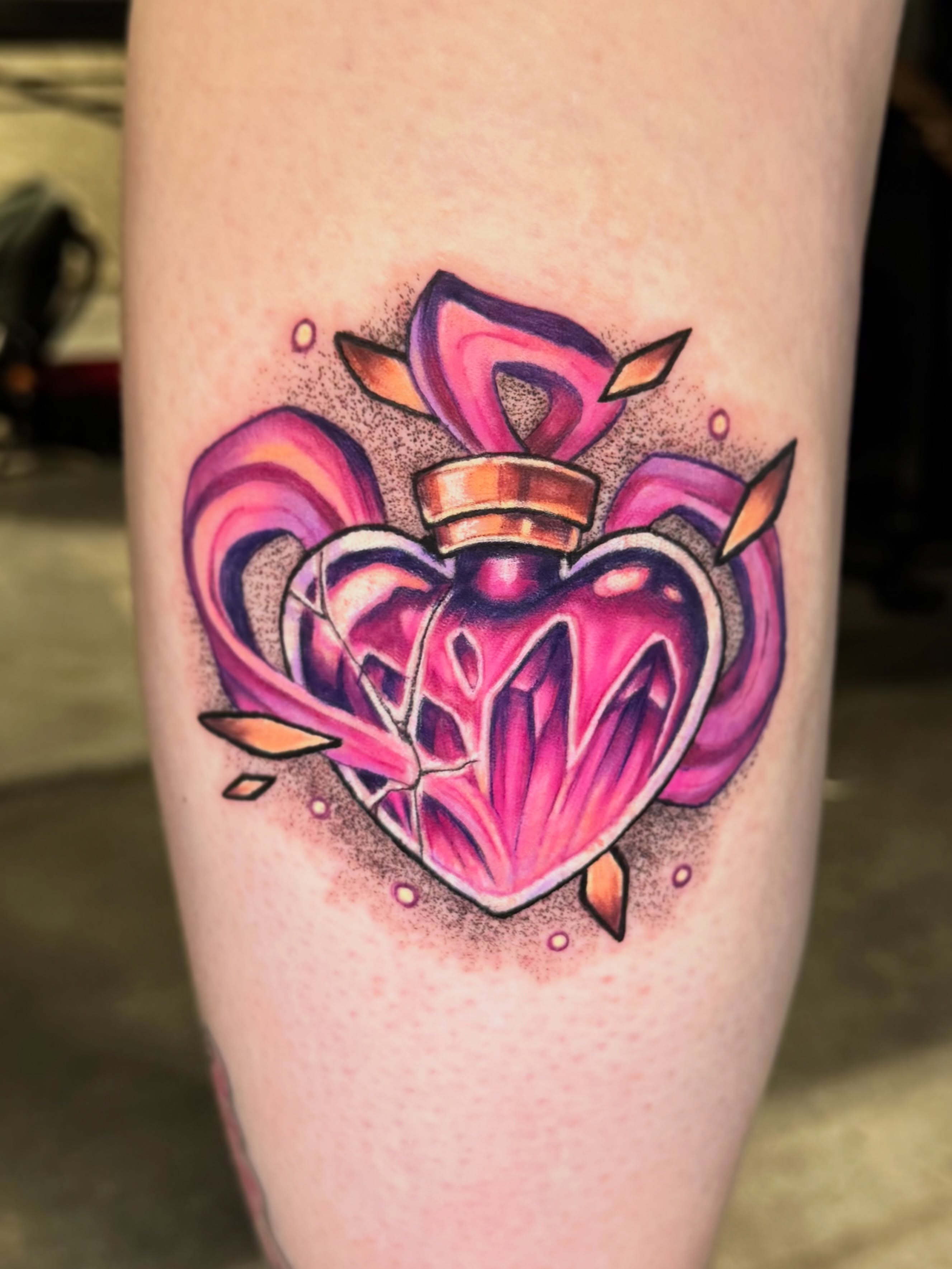 Heart-shaped potion bottle American traditional tattoo on the forearm by Shushe ๐จ๐ด