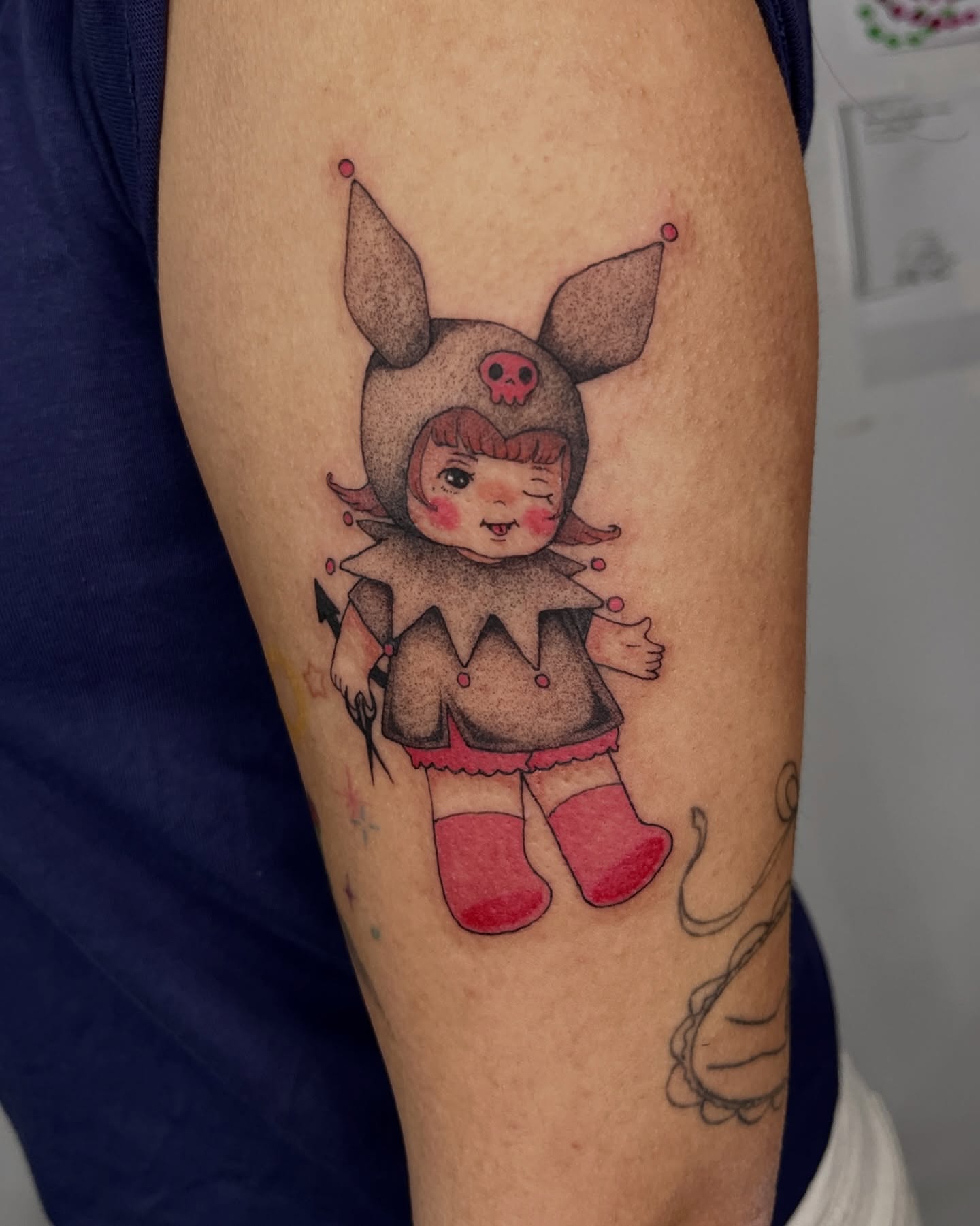 Doll dotwork tattoo on the forearm by Sarah Jurgielewicz