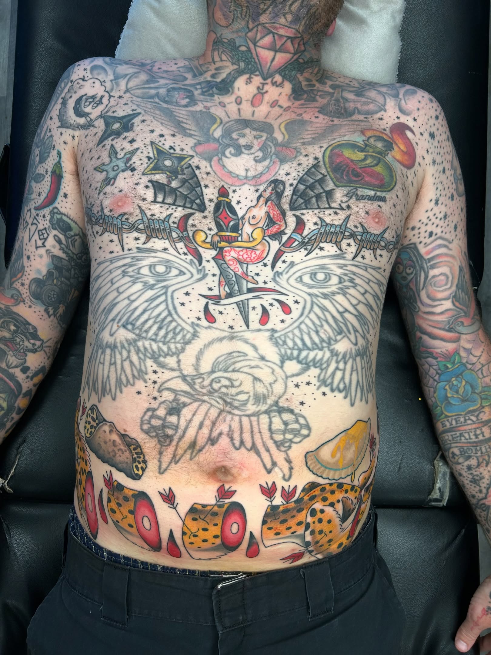 Eagle and angel American traditional tattoo on the back by Audrey Migitsch