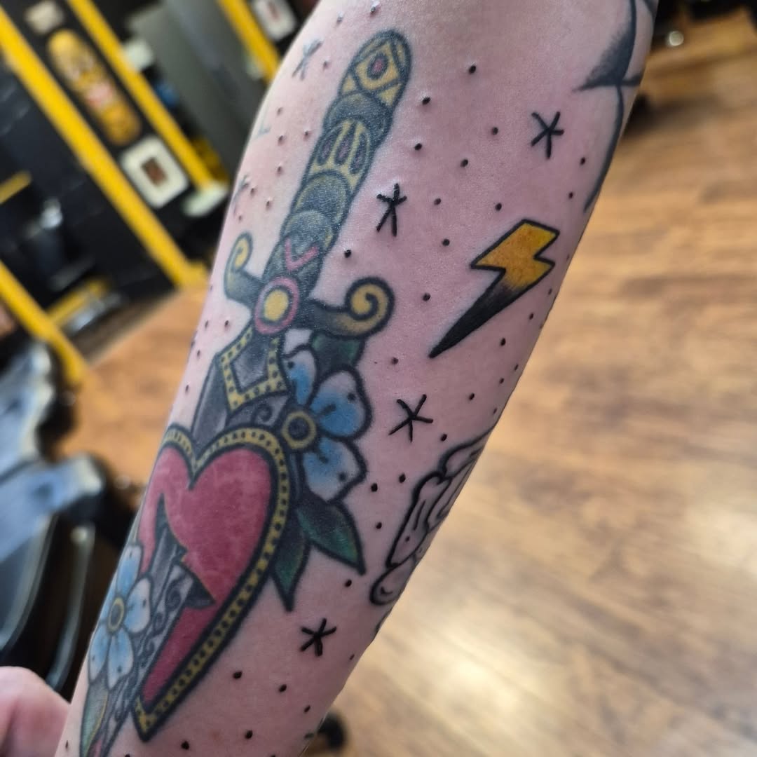 American traditional tattoo on the forearm by Bobby H