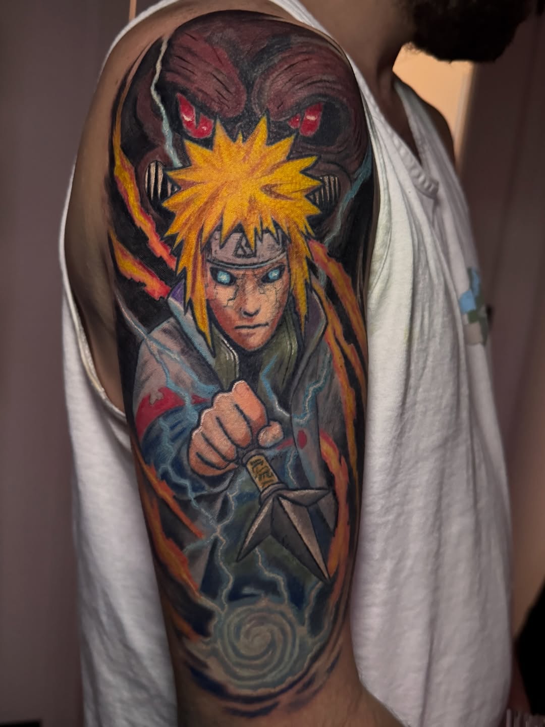 Minato Namikaze from Naruto anime tattoo on the upper arm by Jarrod Gatzke
