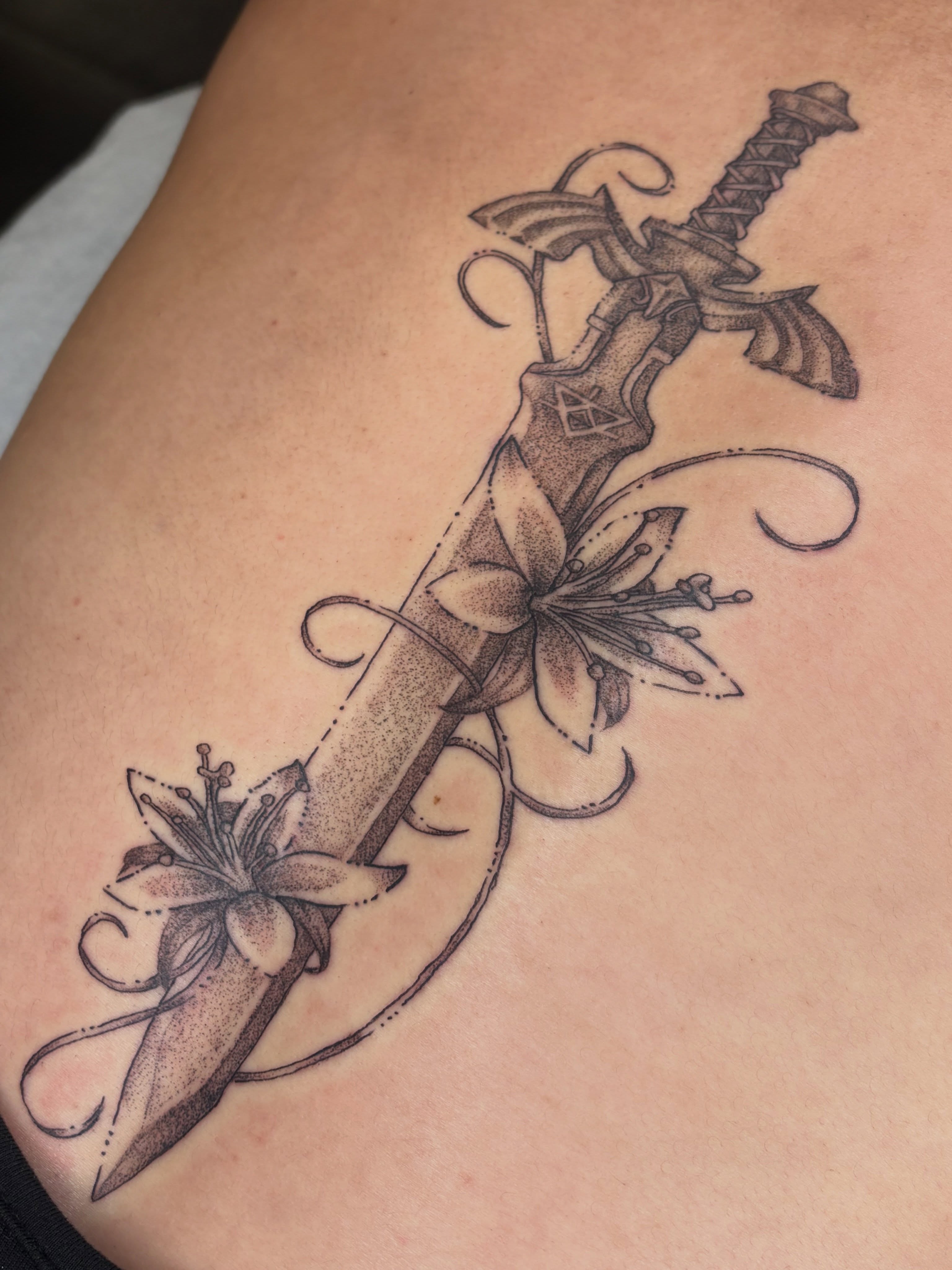 Sword and flowers black and grey tattoo on the thigh by san diego tattoo artist ✩, San Diego, California