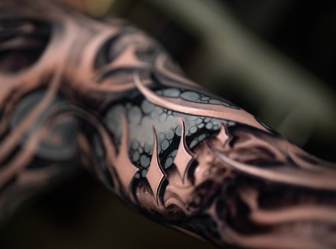 Abstract organic shapes realism tattoo on the forearm by Victor Portugal Tattoo