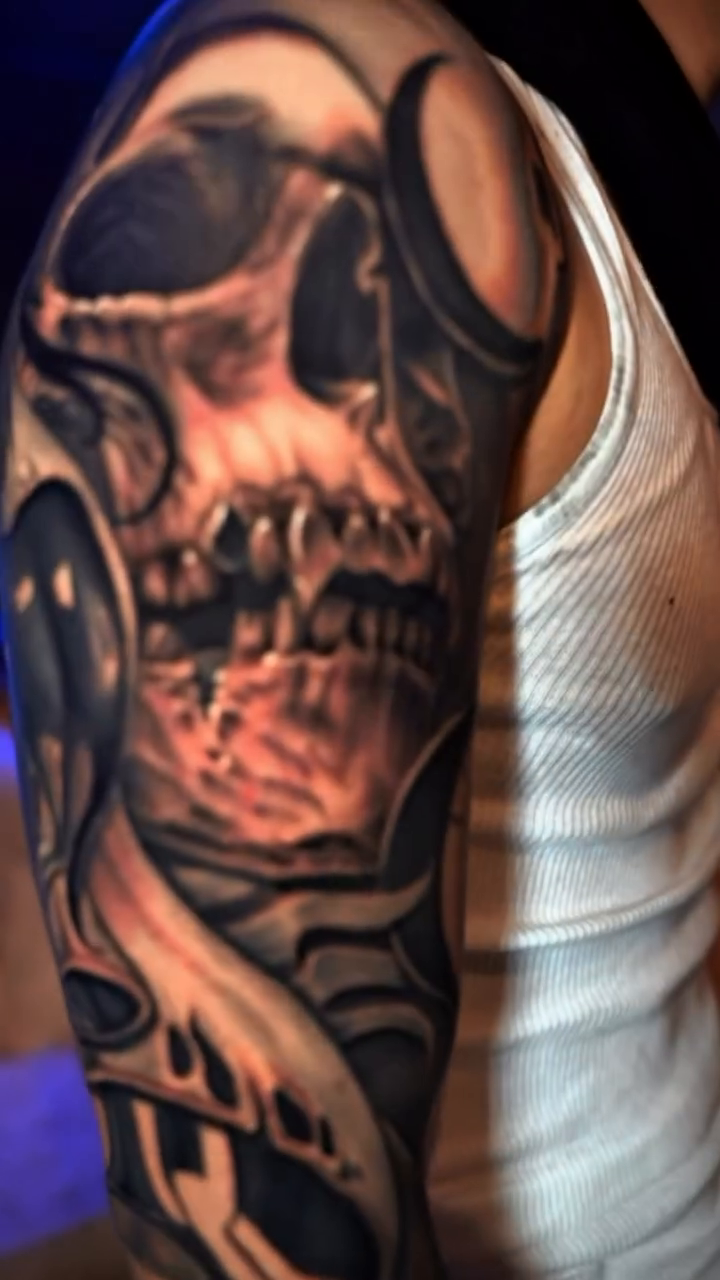 Skull with abstract elements realism tattoo by Cristian Rodriguez